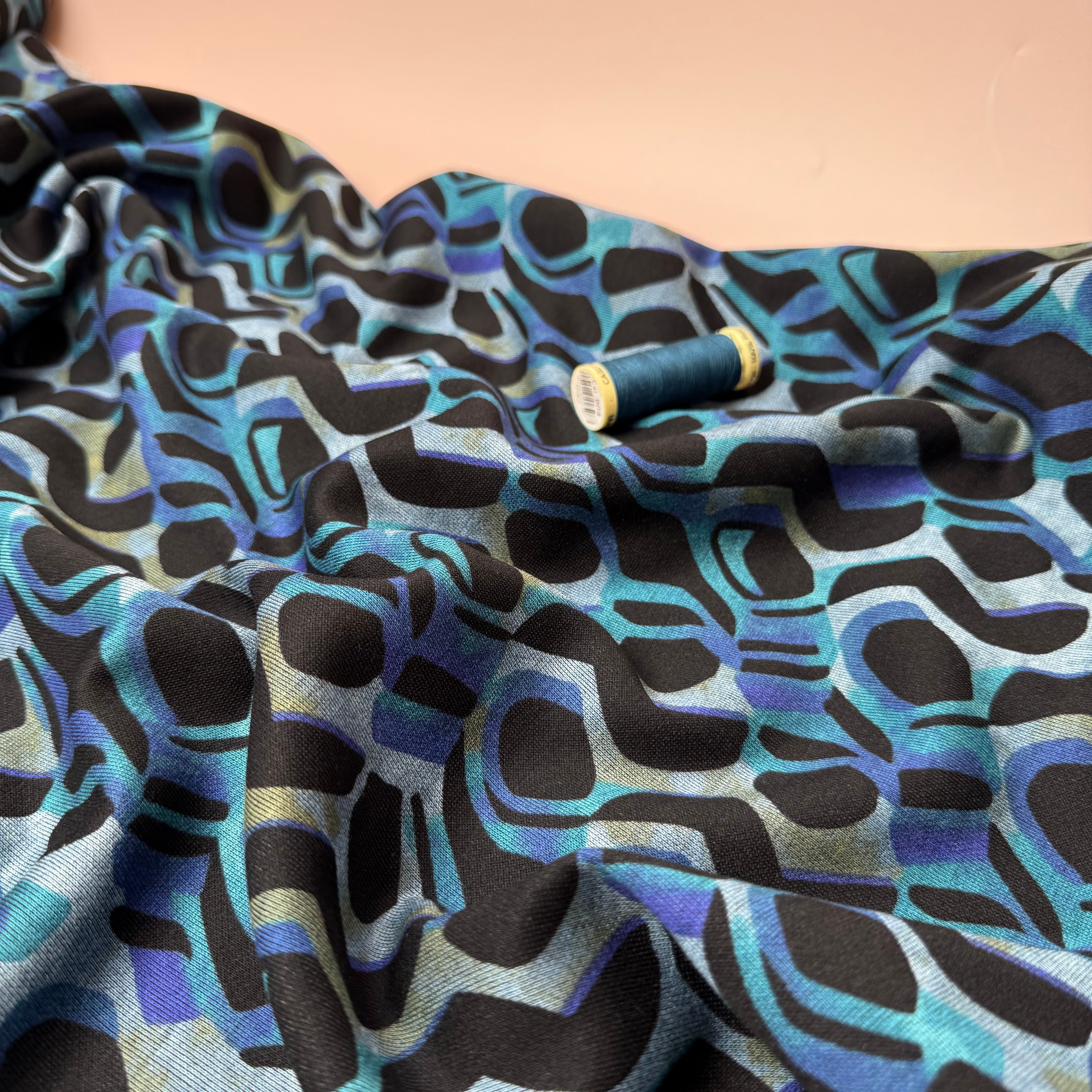 Graphic Swirls in Petrol Soft Ponte Interlock Jersey Fabric