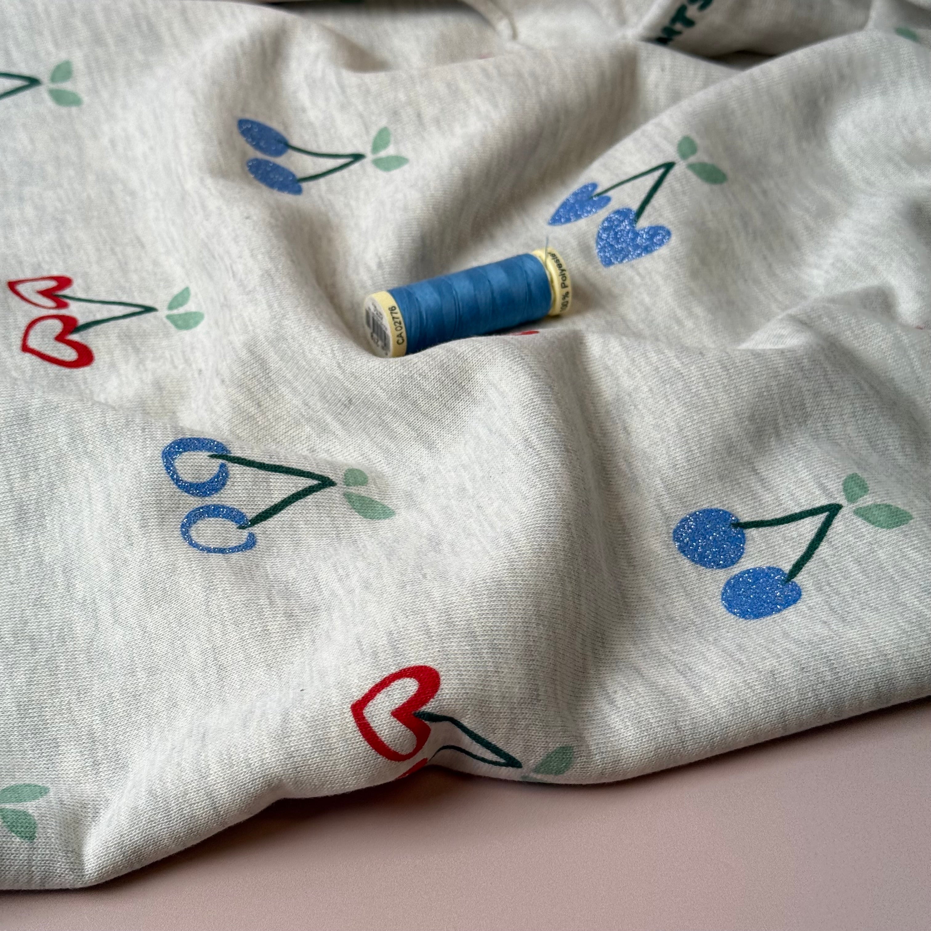 Glitter Cherries on Melange Ecru Cotton Sweat-shirting Fabric