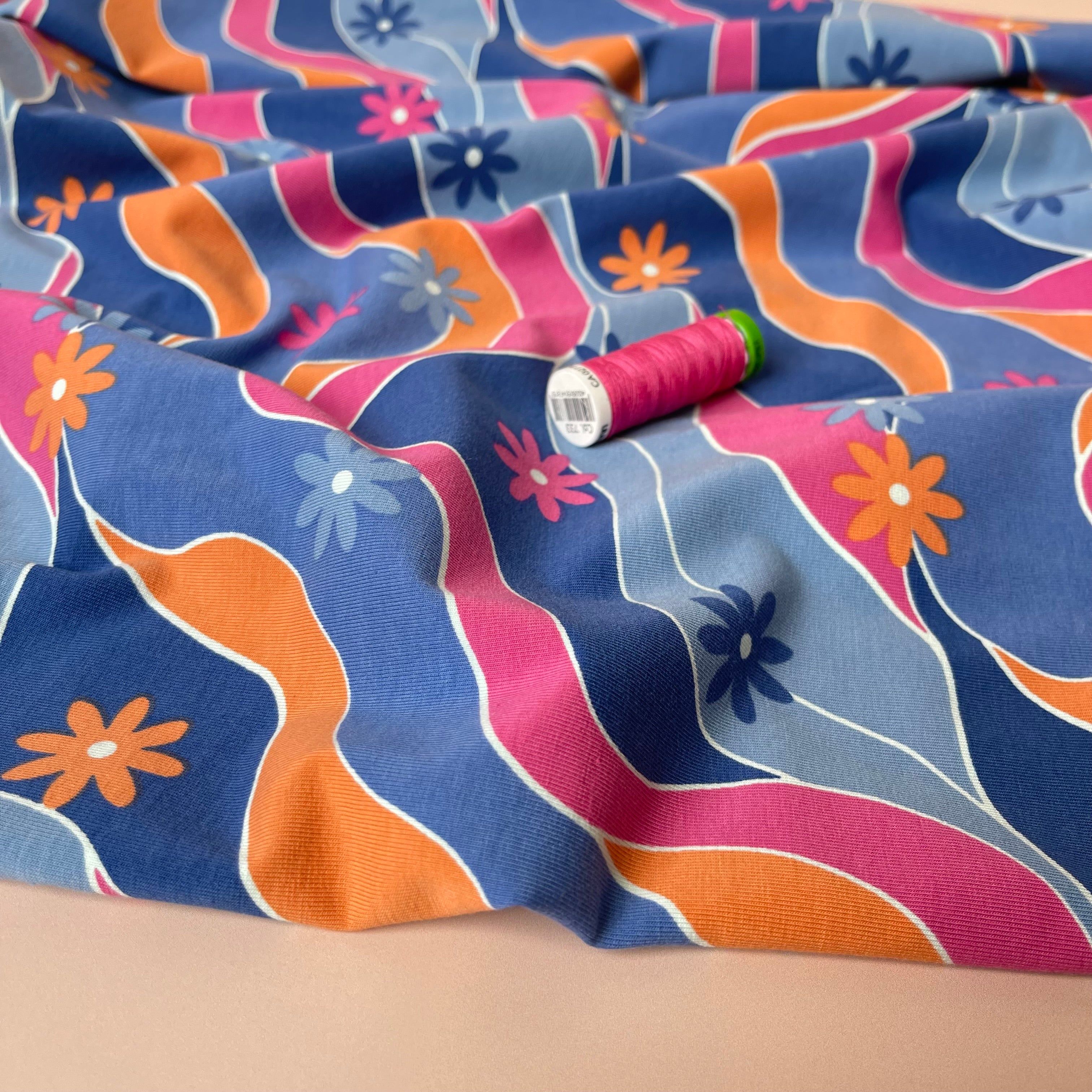Retro Daisies on Blue Cotton Jersey Fabric