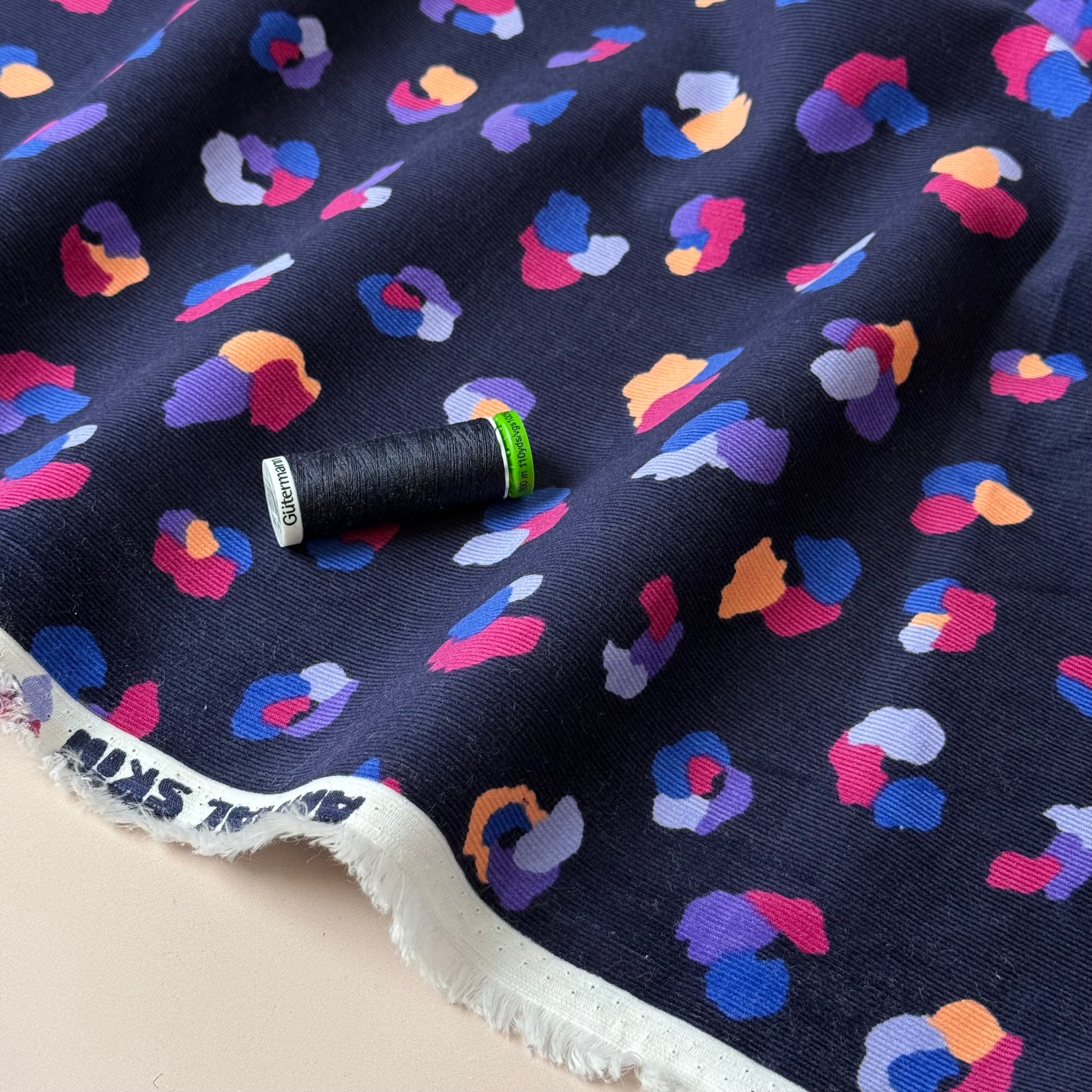 Rainbow Leopard on Navy Cotton Needlecord