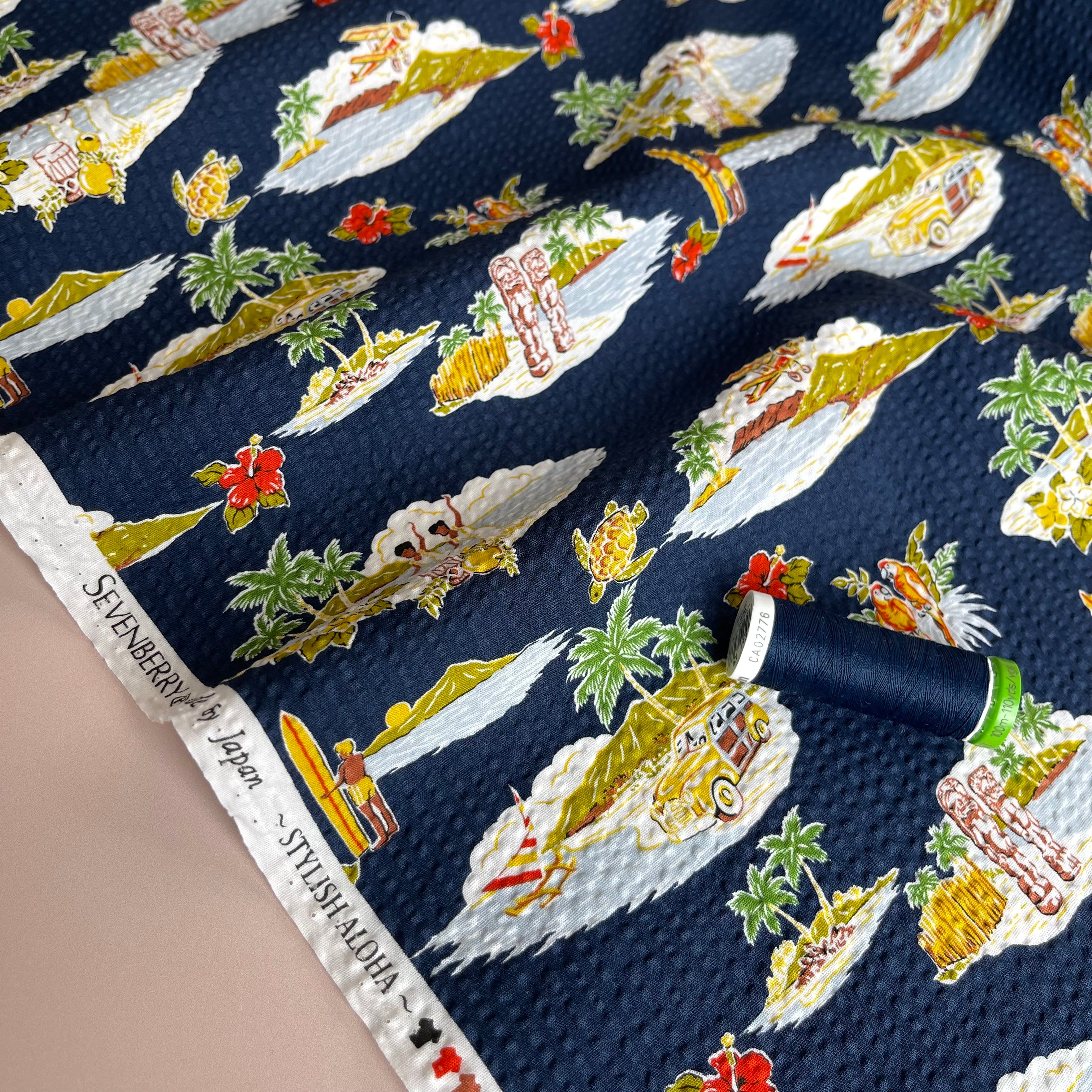 Paradise Islands on Navy Cotton Seersucker Fabric