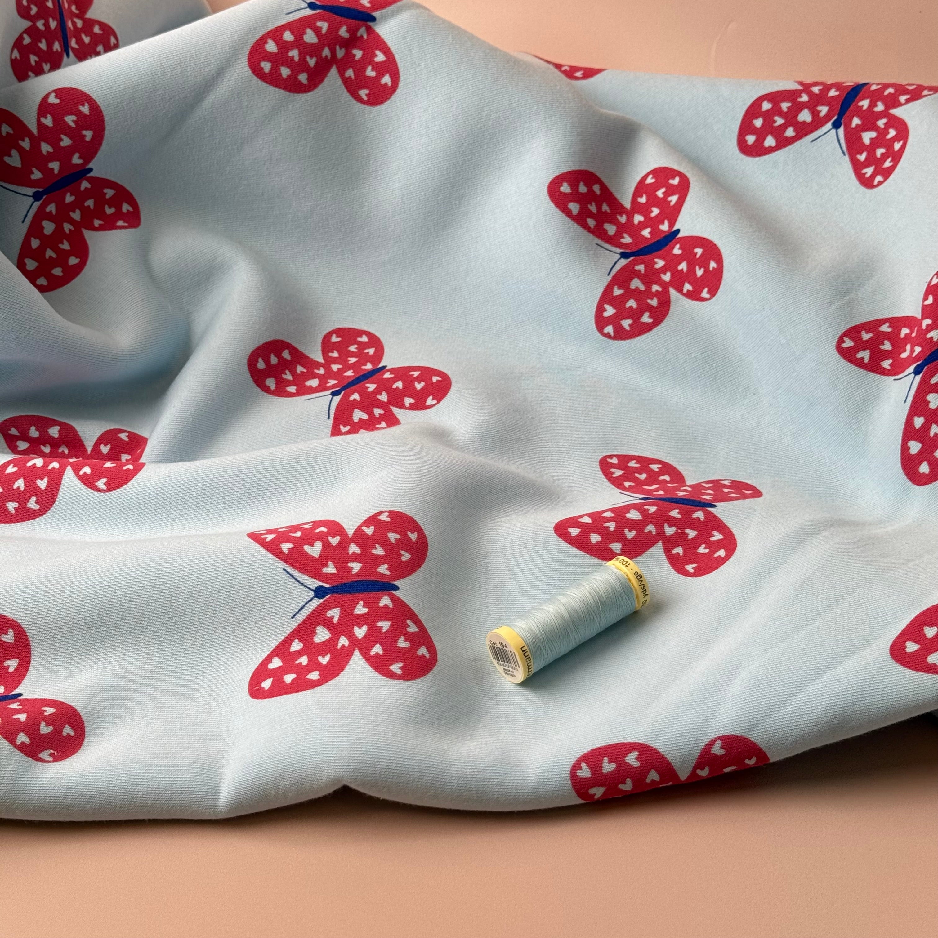 Butterflies on Icy Blue Soft Cotton Sweat-shirting Fabric