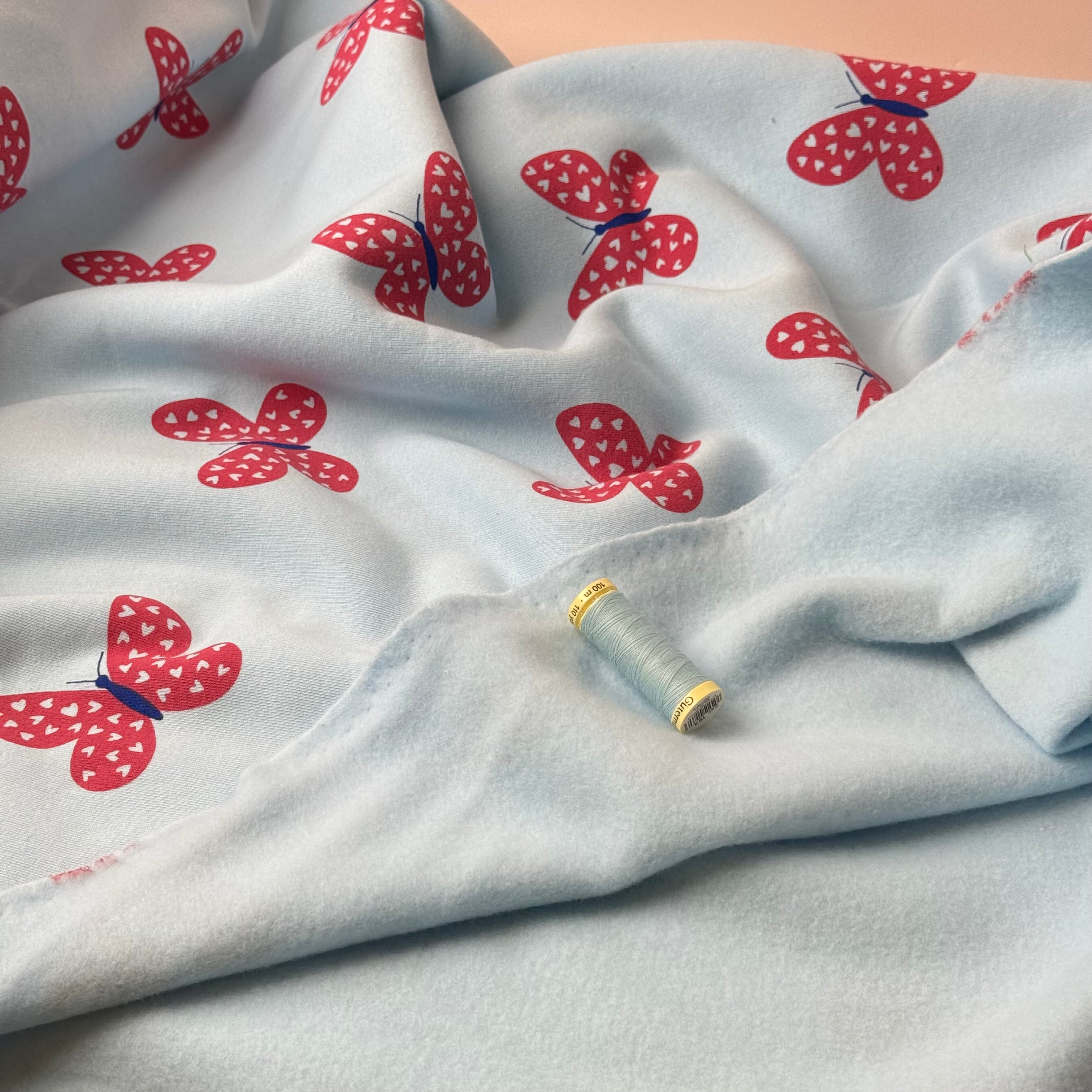 Butterflies on Icy Blue Soft Cotton Sweat-shirting Fabric