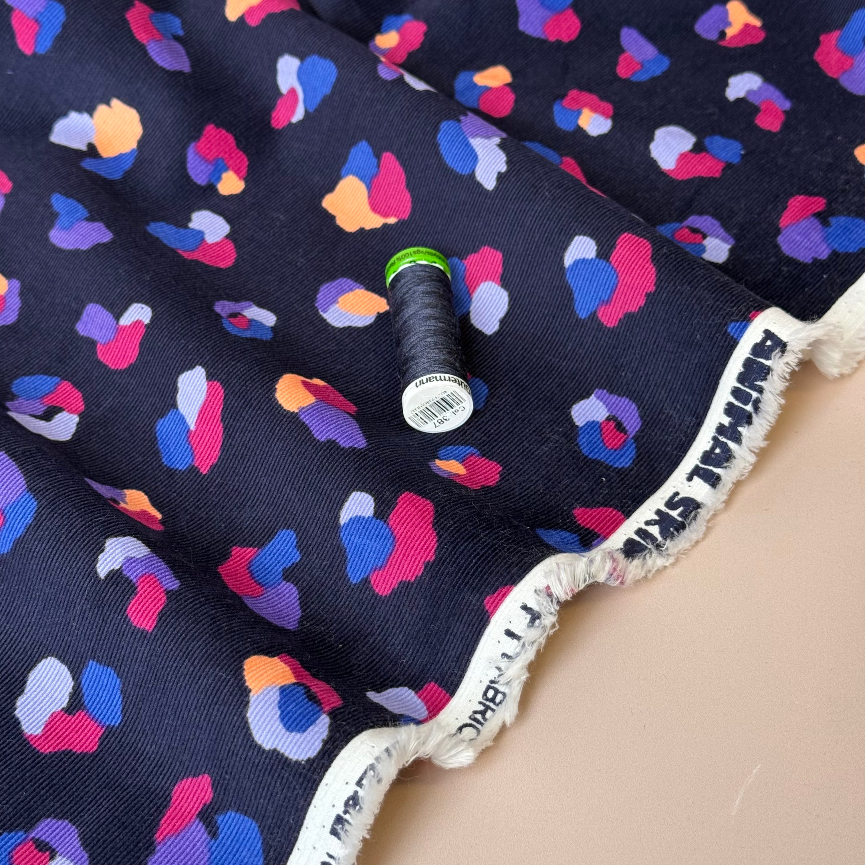Rainbow Leopard on Navy Cotton Needlecord