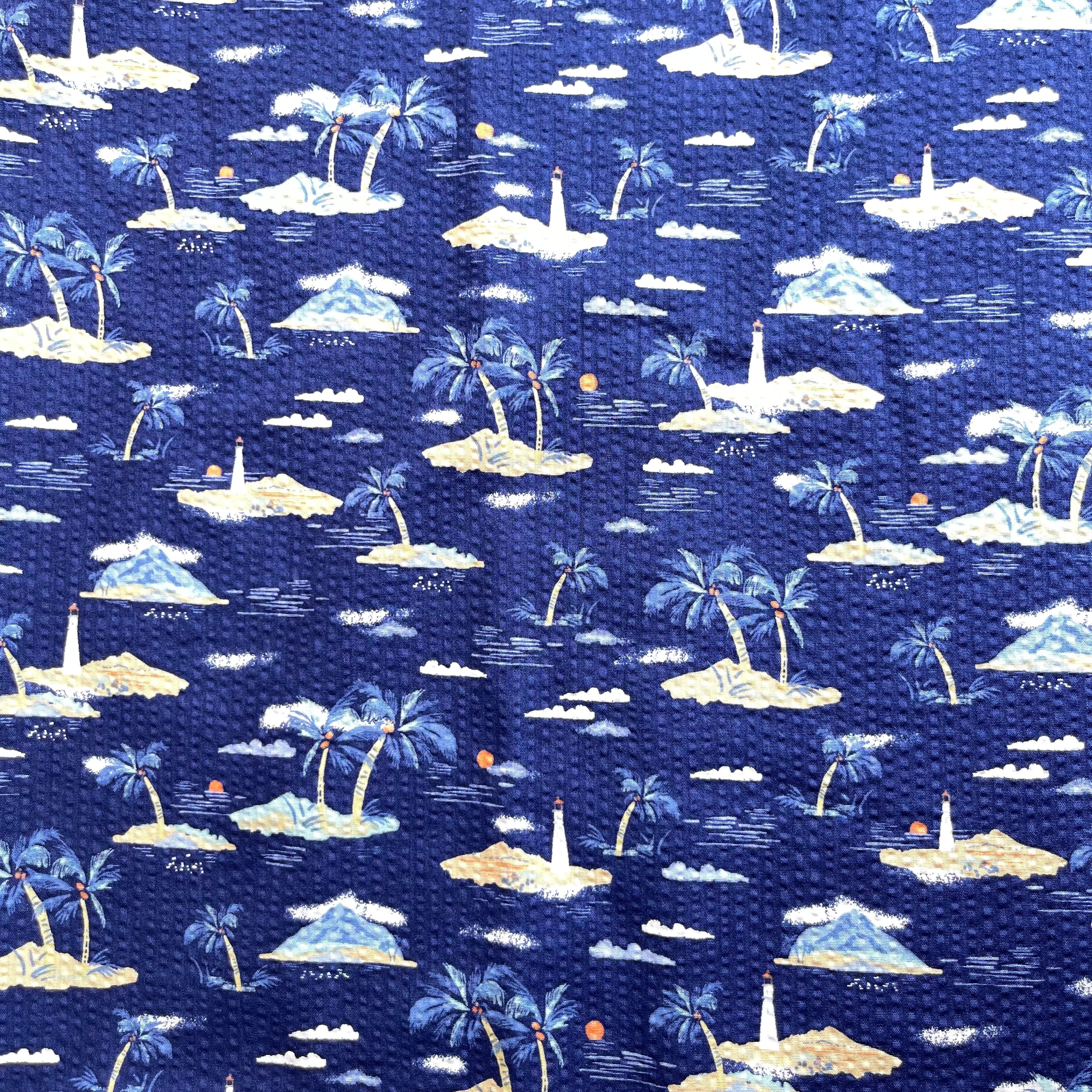Holiday Islands on Navy Cotton Seersucker Fabric