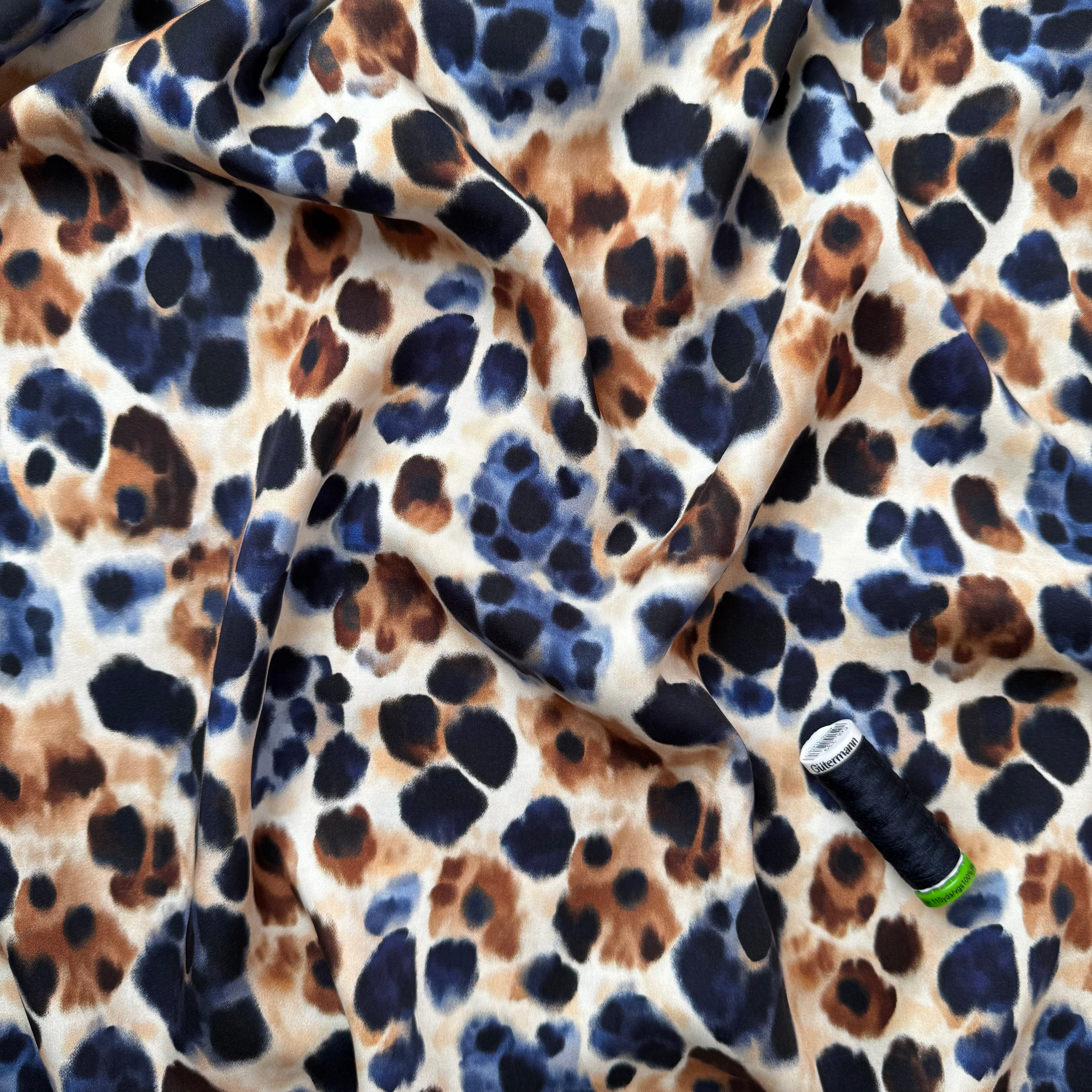 Animal Spots Viscose Sateen Fabric