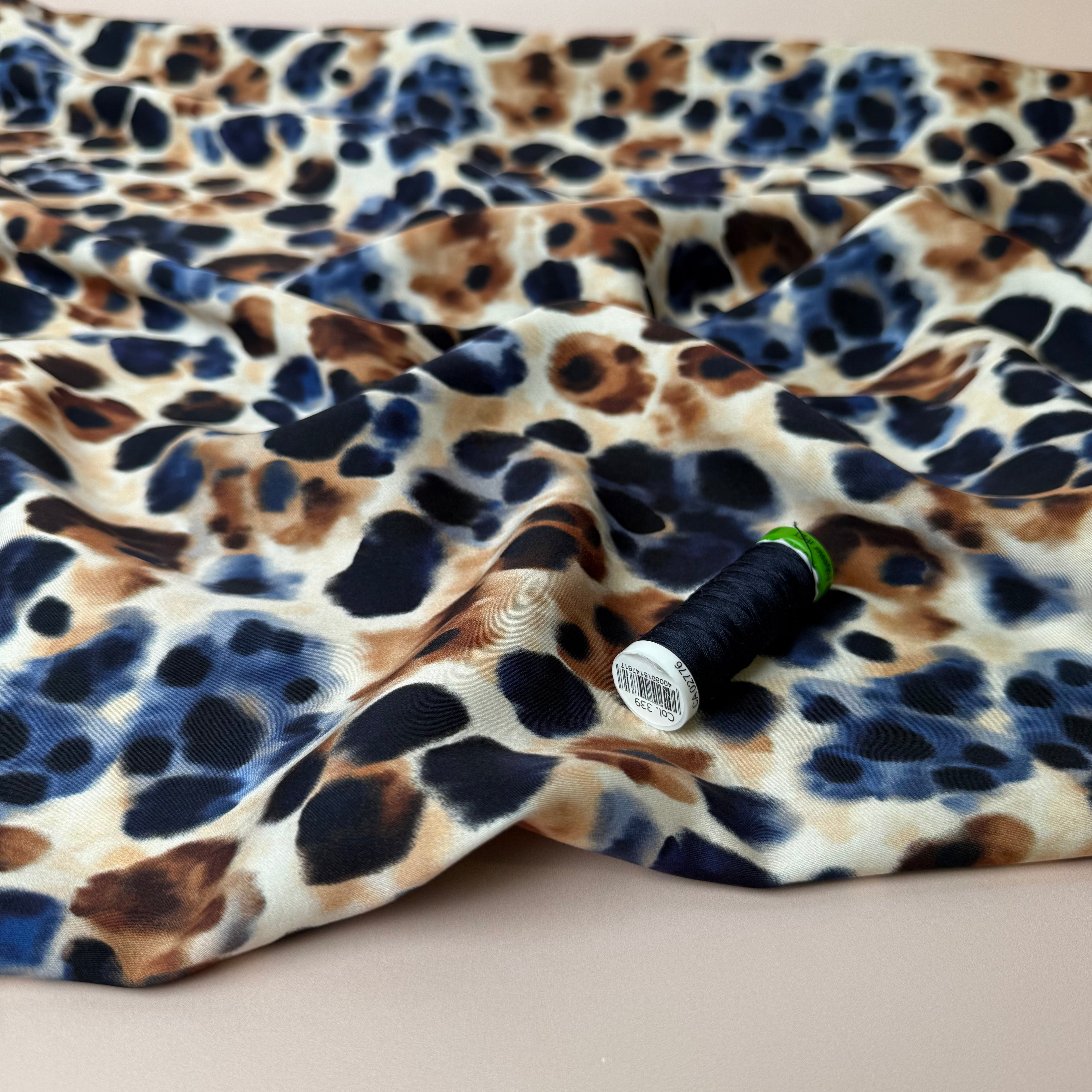 Animal Spots Viscose Sateen Fabric