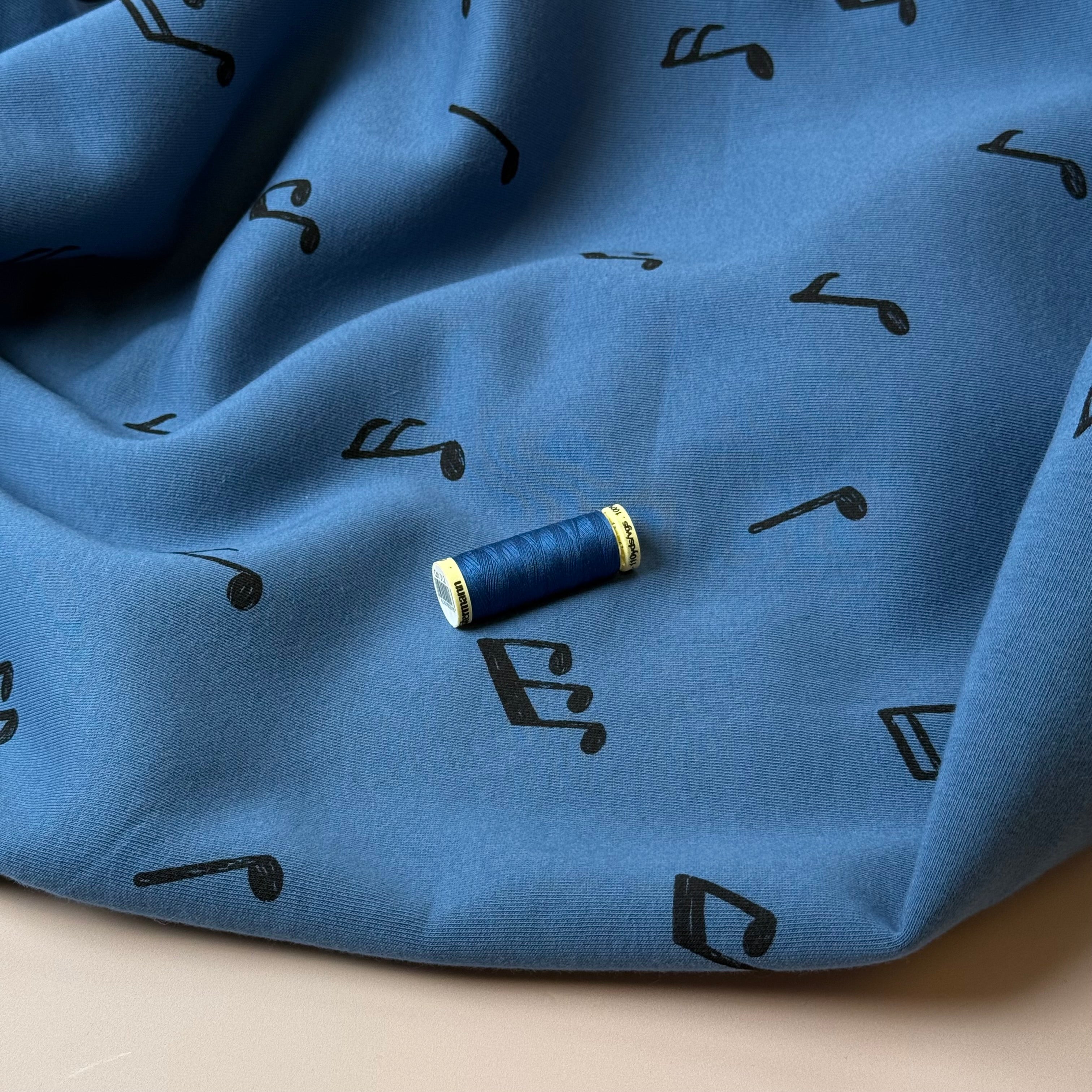 Music Notes on Blue Soft Cotton Jogging Sweat-shirting Fabric