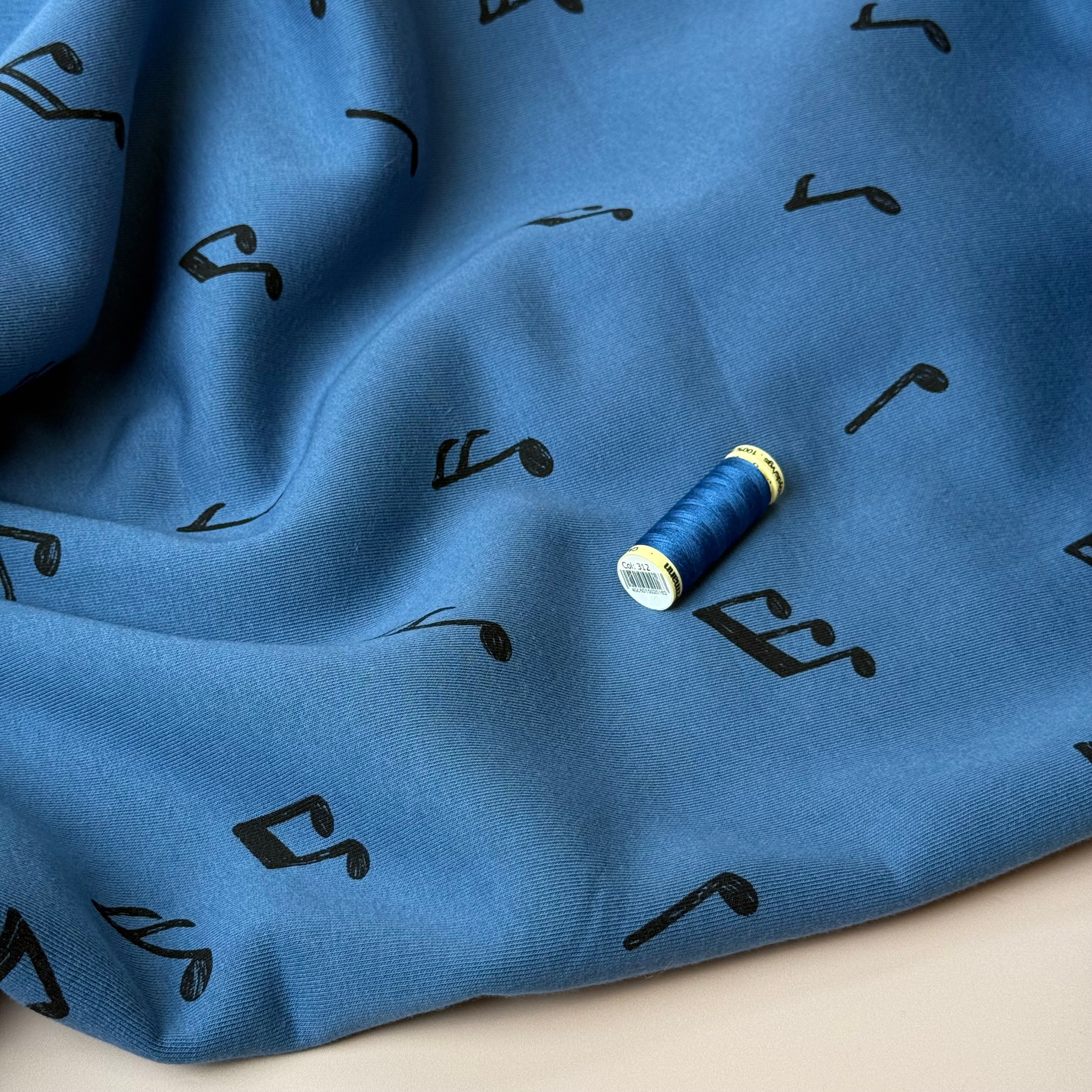 Music Notes on Blue Soft Cotton Jogging Sweat-shirting Fabric