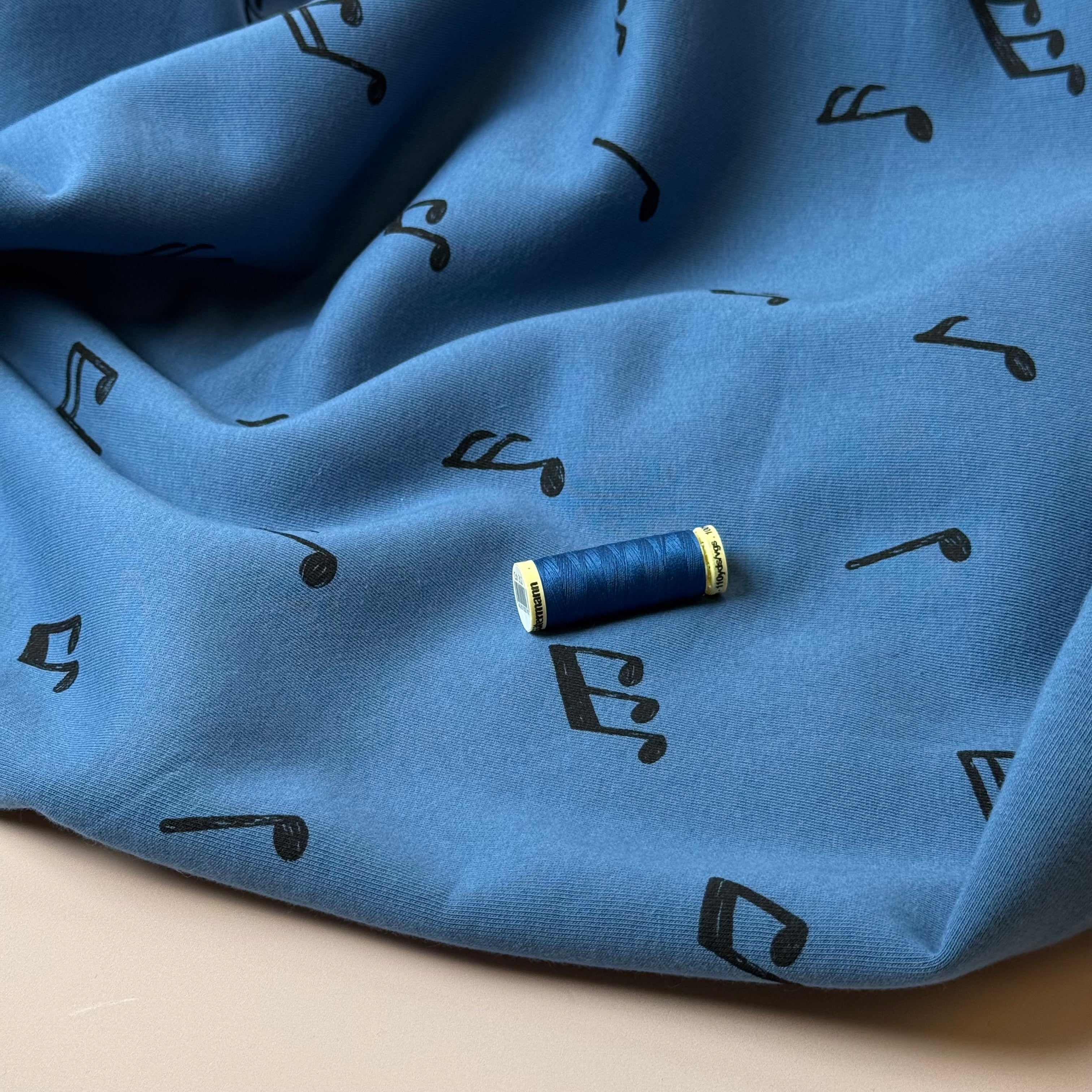 Music Notes on Blue Soft Cotton Jogging Sweat-shirting Fabric