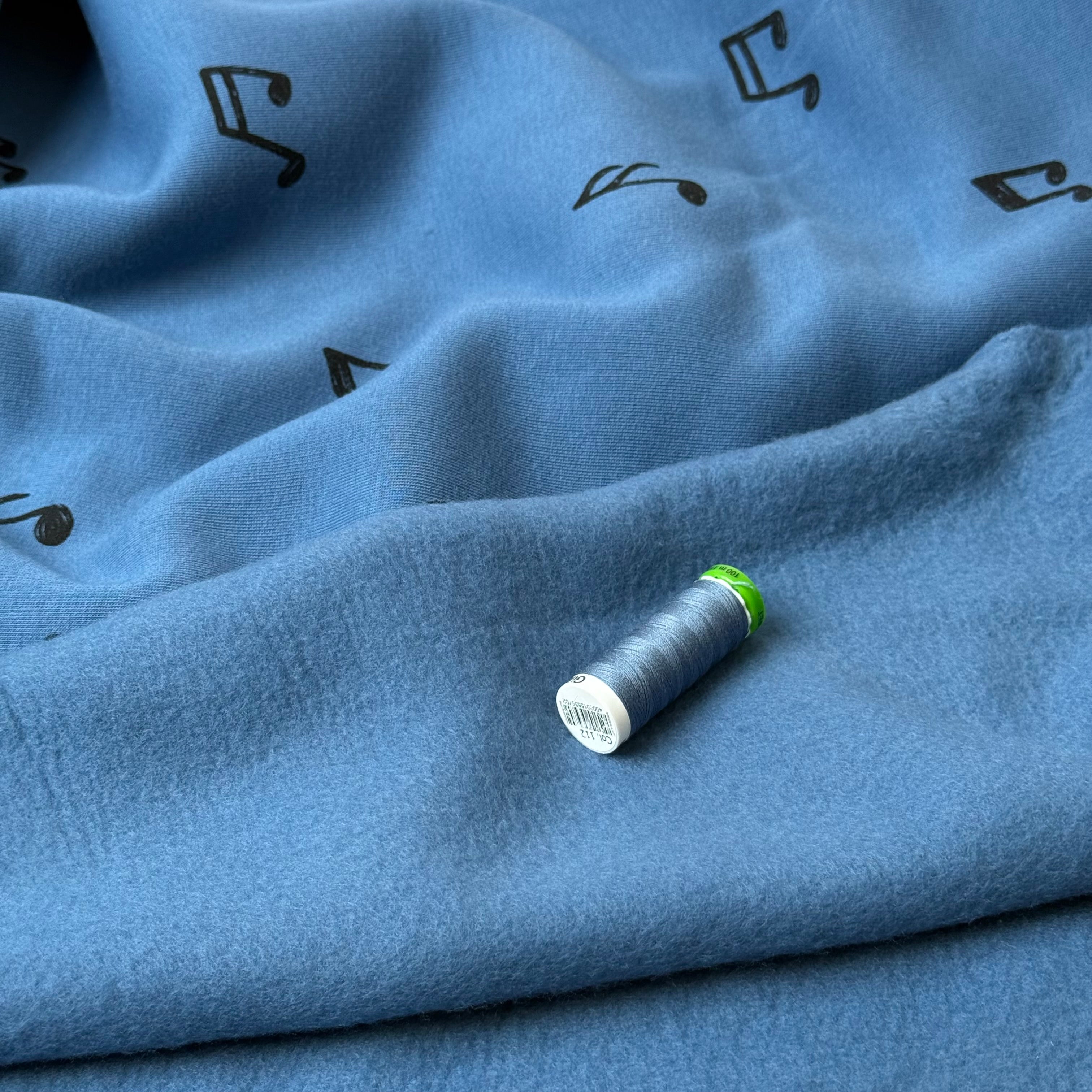 Music Notes on Blue Soft Cotton Jogging Sweat-shirting Fabric