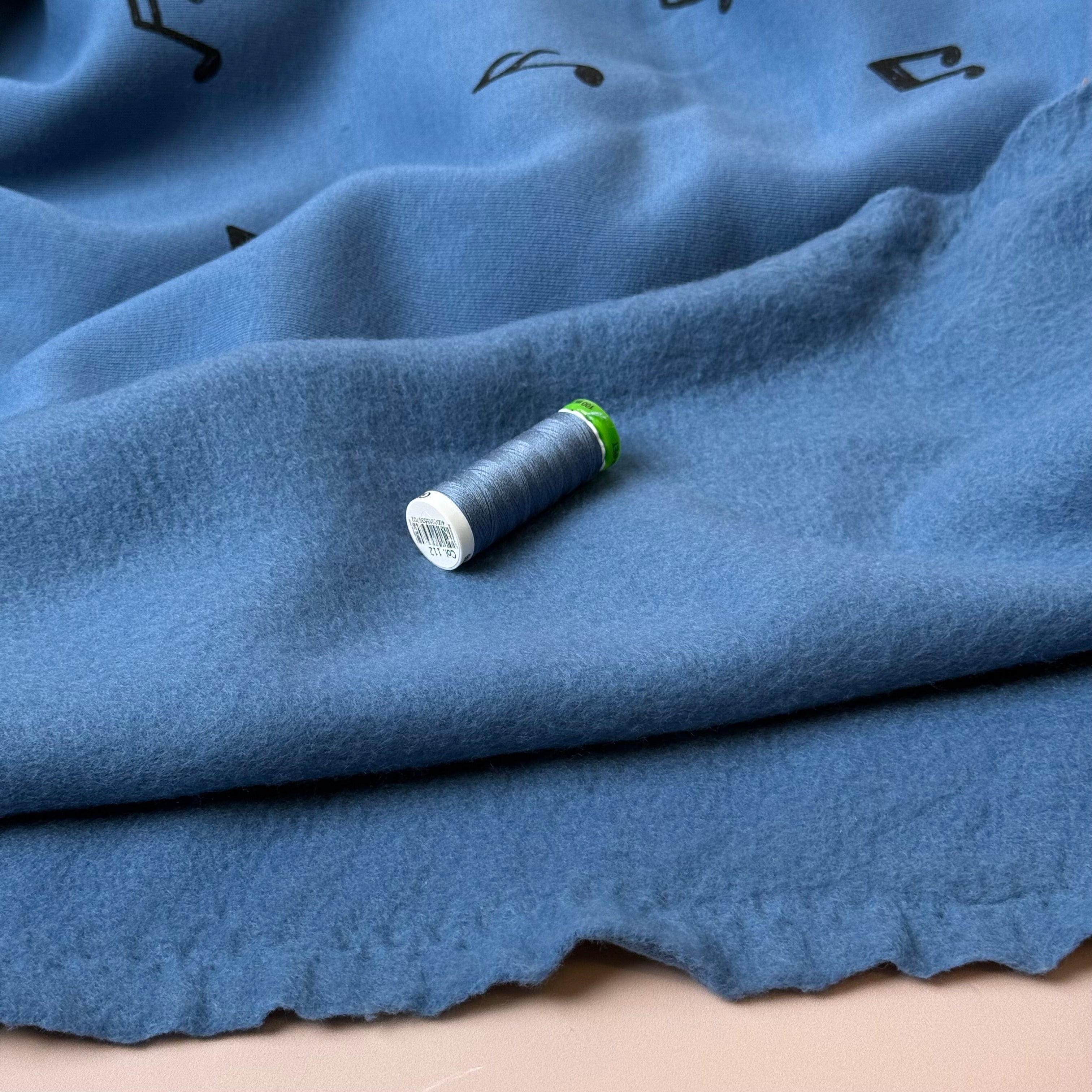 Music Notes on Blue Soft Cotton Jogging Sweat-shirting Fabric