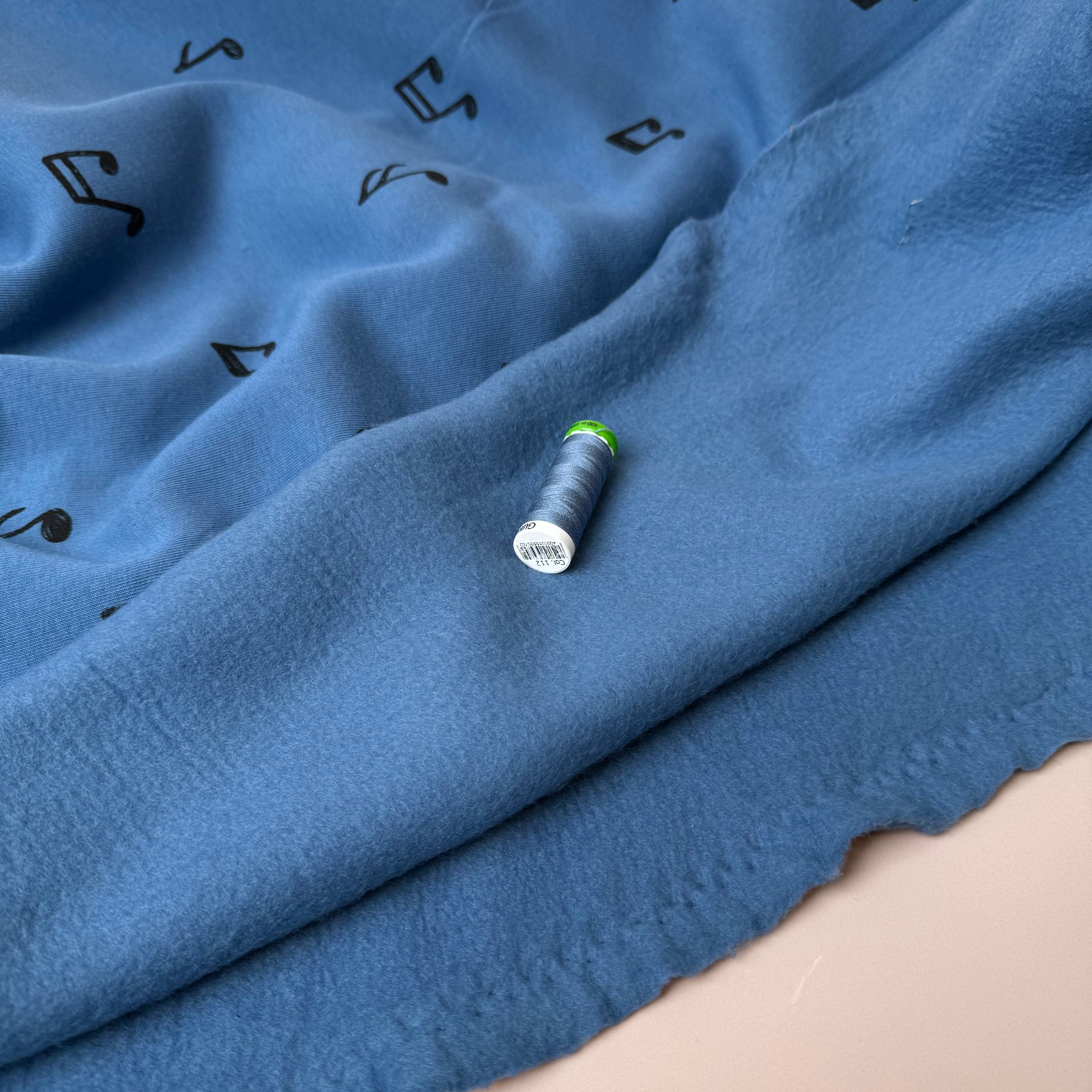 Music Notes on Blue Soft Cotton Jogging Sweat-shirting Fabric