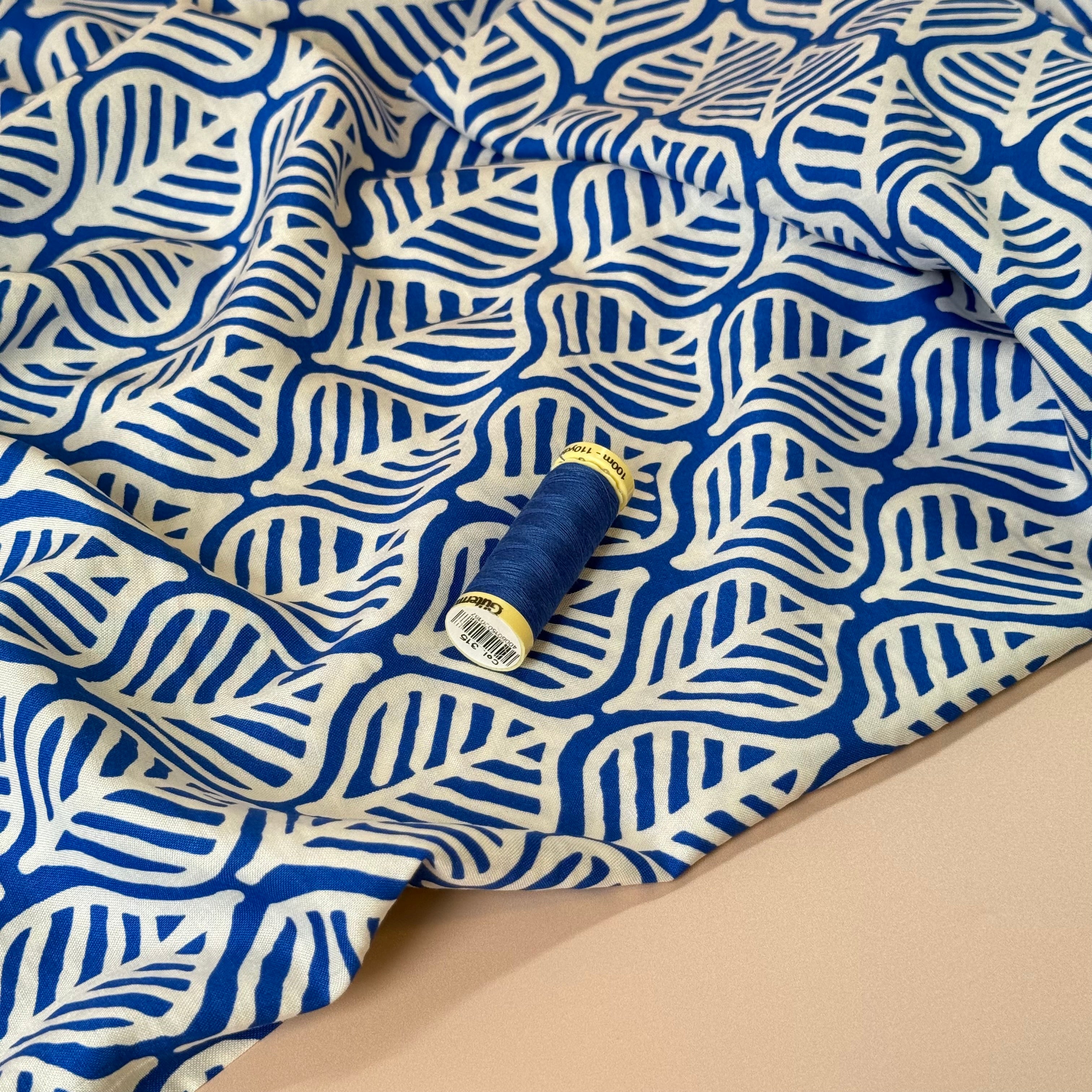 Deadstock Etched Leaves on Cobalt Viscose Fabric