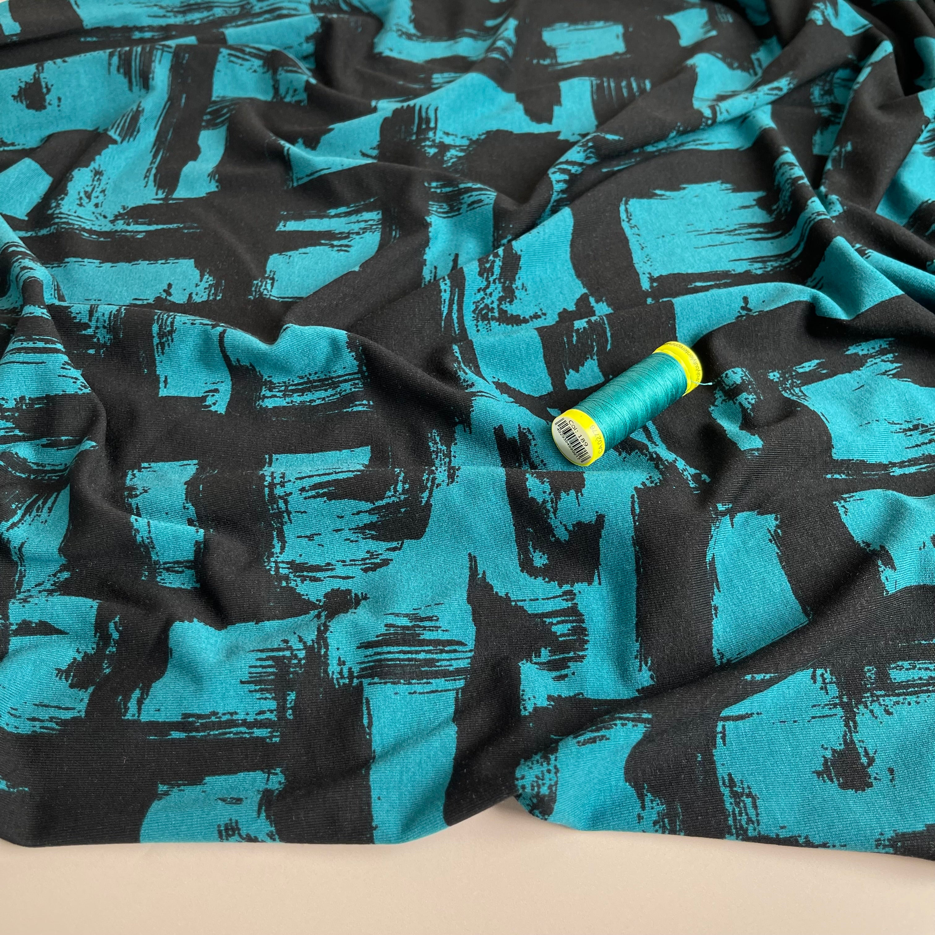 REMNANT 0.45 Metres (plus free section with fault) Labyrinth in Petrol De Luxe Viscose Jersey Fabric