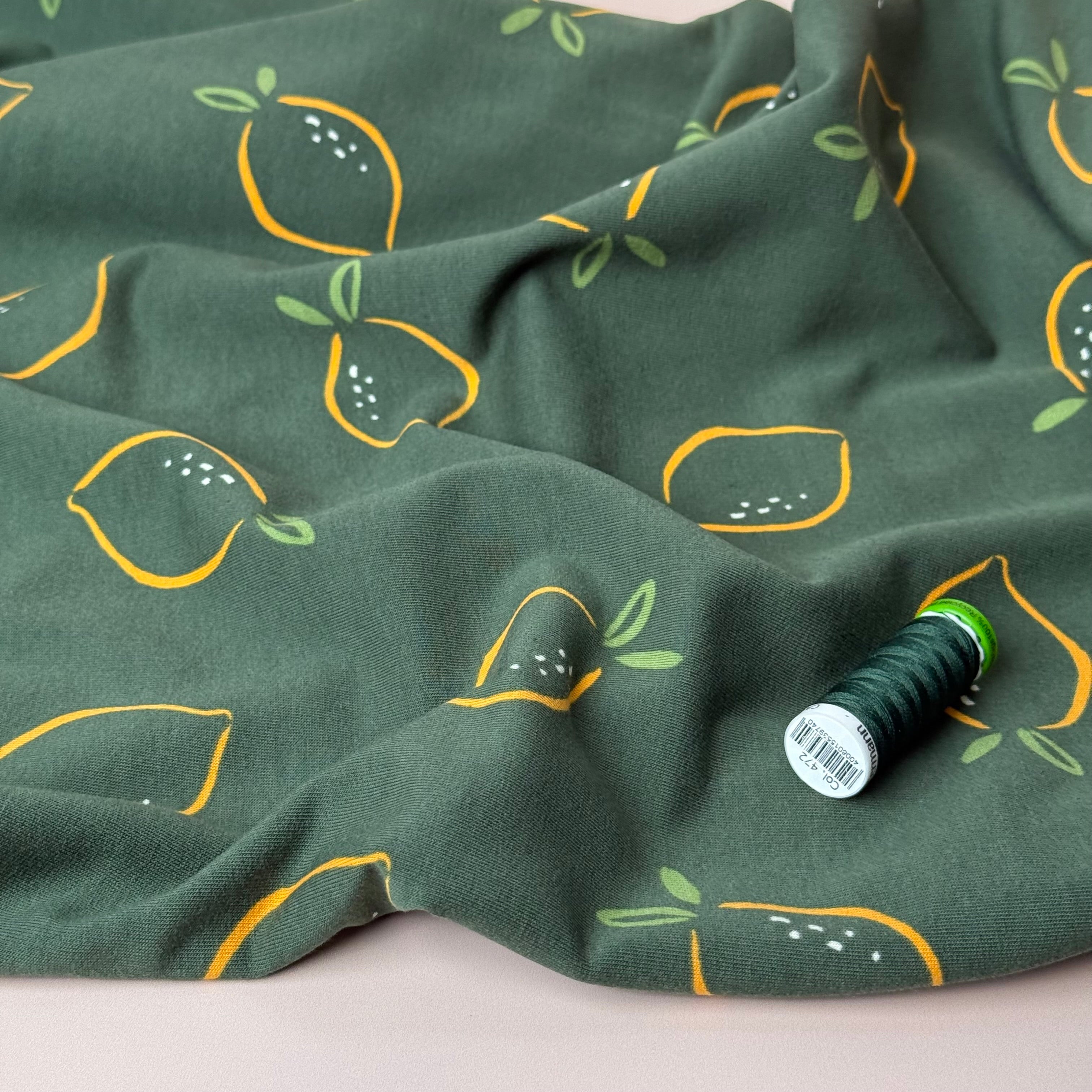 Lemons on Green Cotton Sweat-shirting Fabric