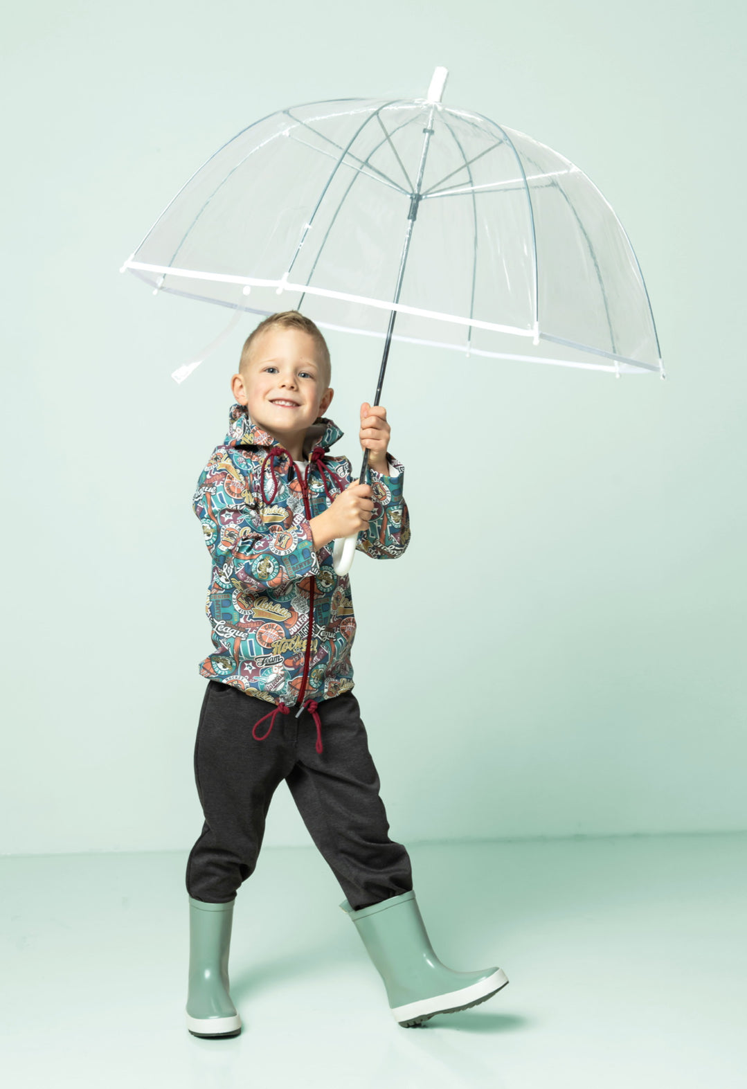 Sports Themed Teal Raincoat Fabric