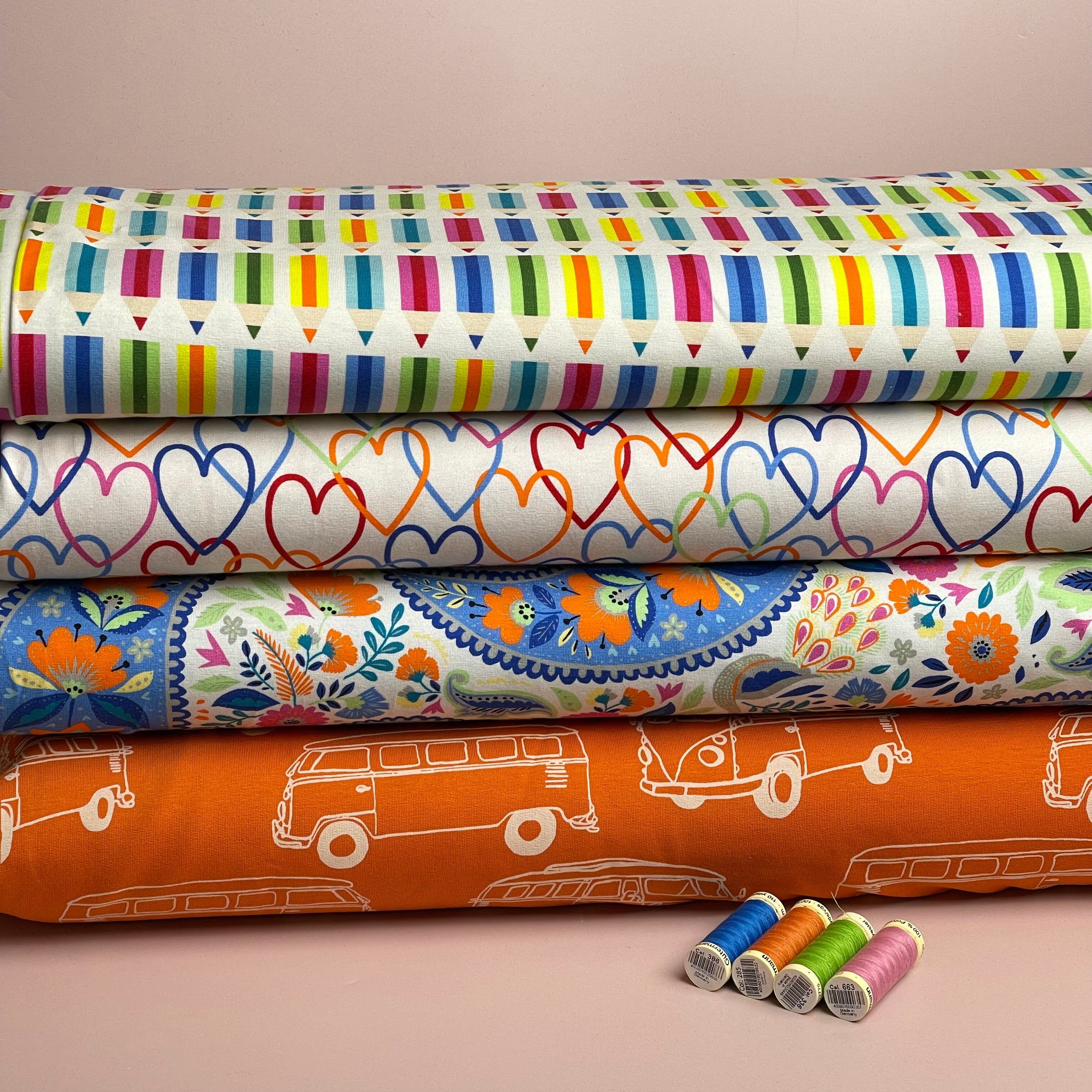 Rainbow Pencils on White Cotton Jersey Fabric