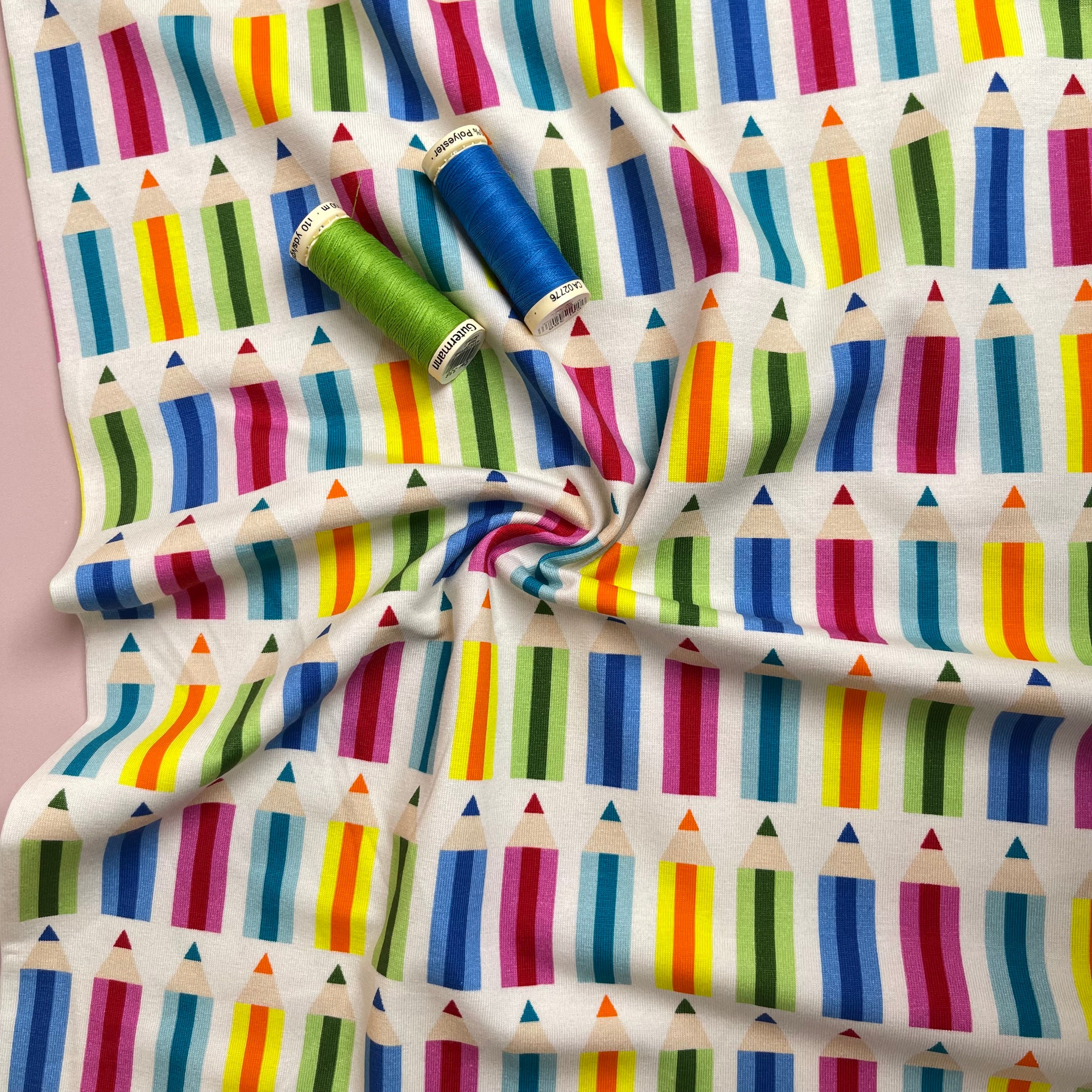 Rainbow Pencils on White Cotton Jersey Fabric