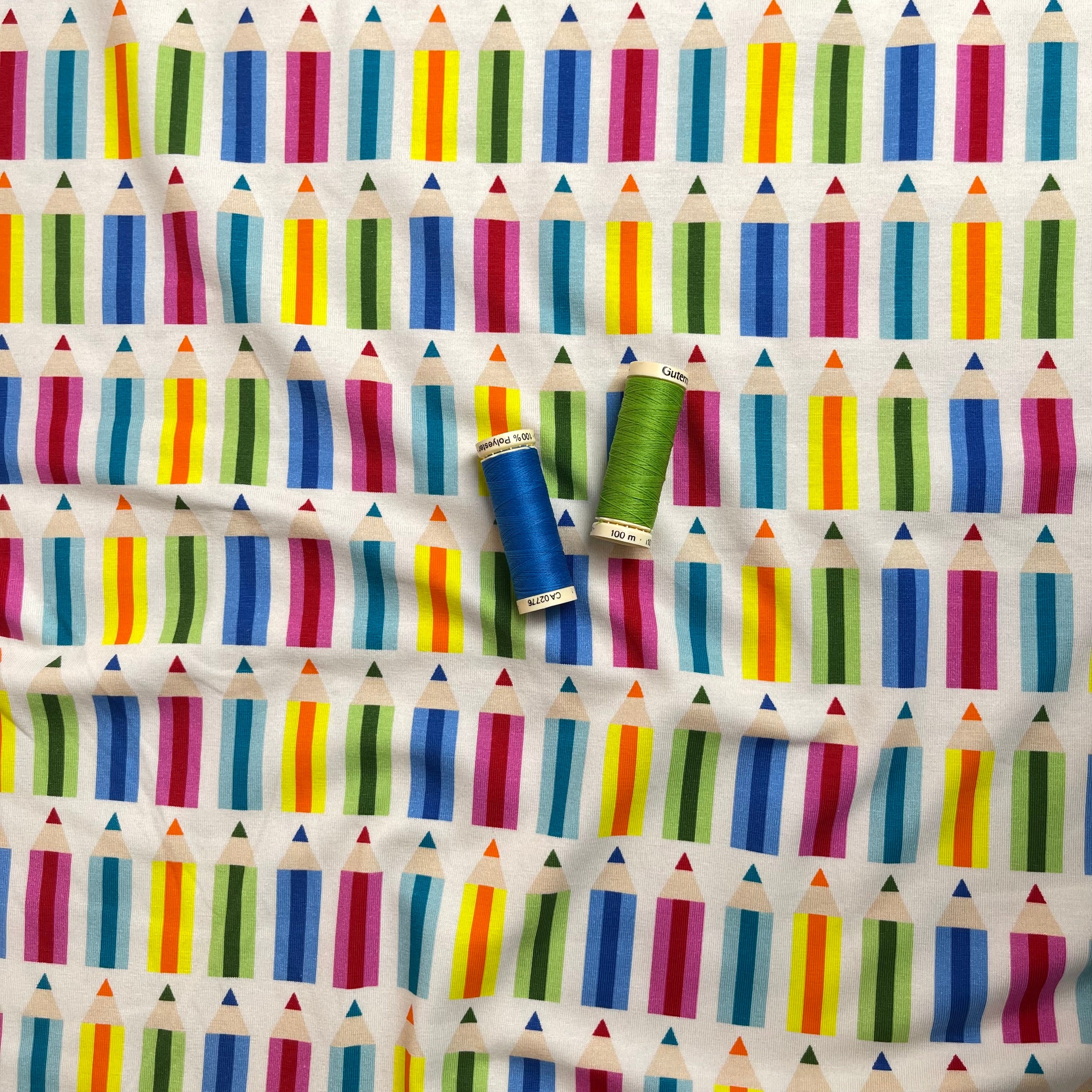 Rainbow Pencils on White Cotton Jersey Fabric