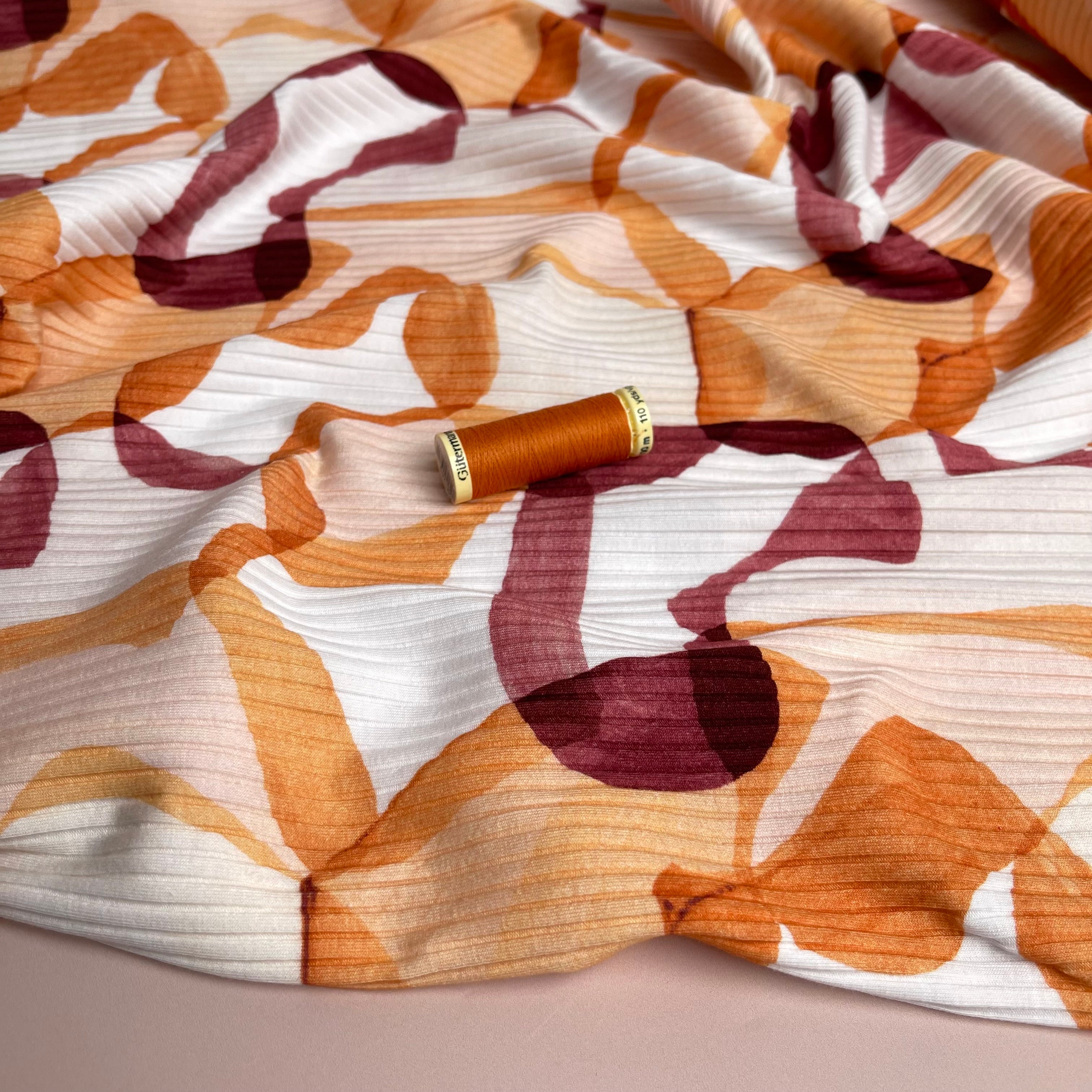 REMNANT 0.55 Metre - Abstract Shapes Rust Cotton Ribbed Jersey