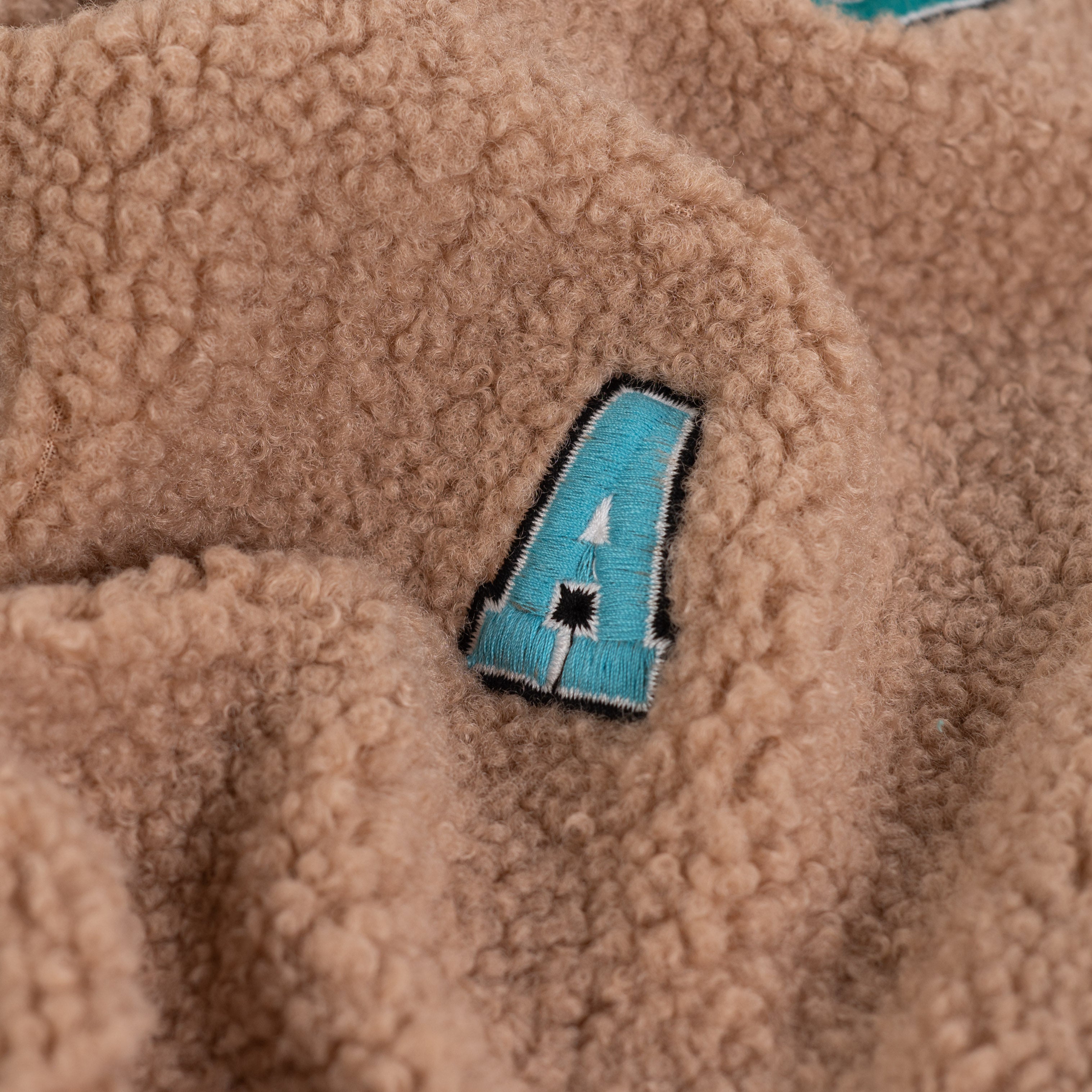 Teddy Boucle with Embroidered Letters Coating Fabric