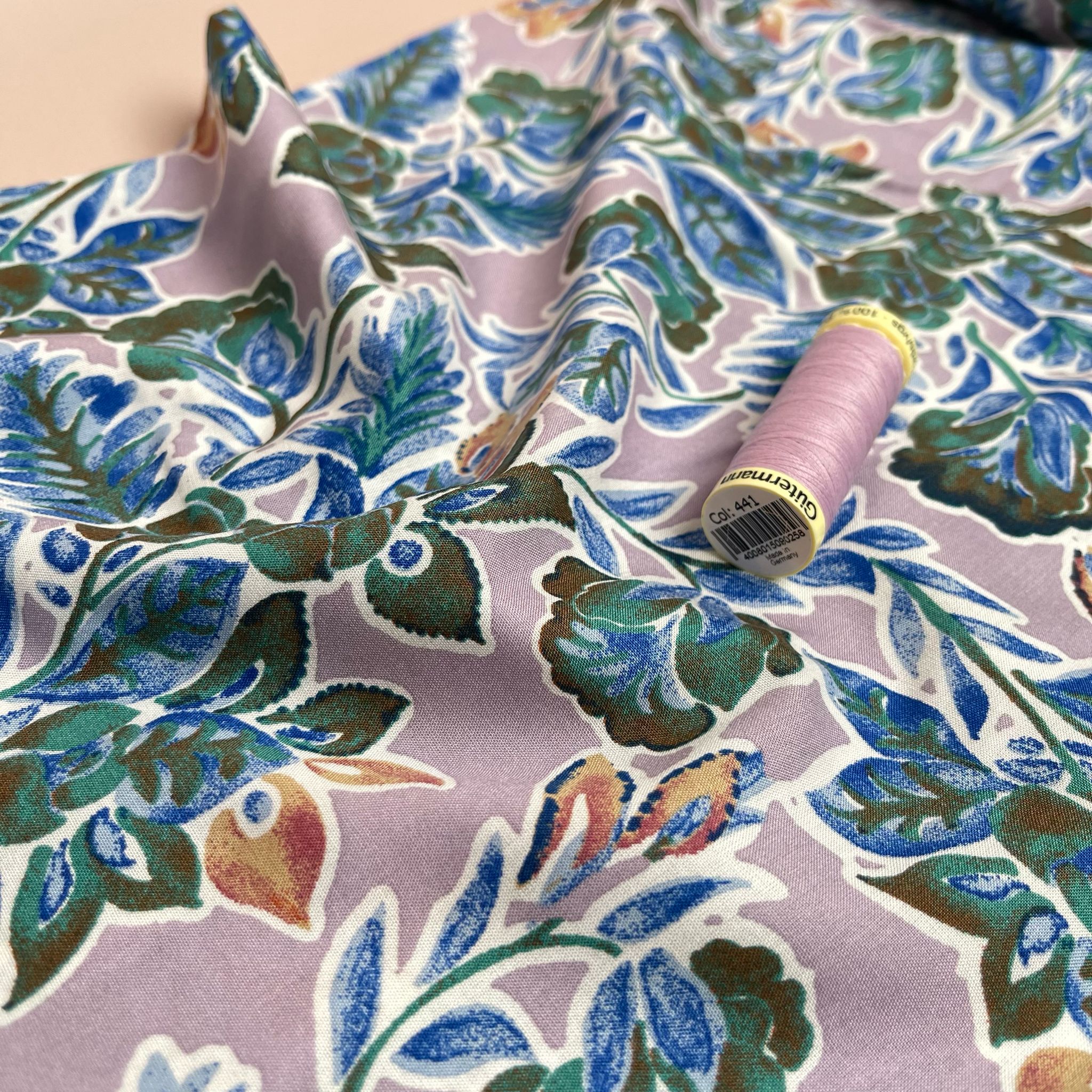 Green Foliage on Mauve Viscose Fabric