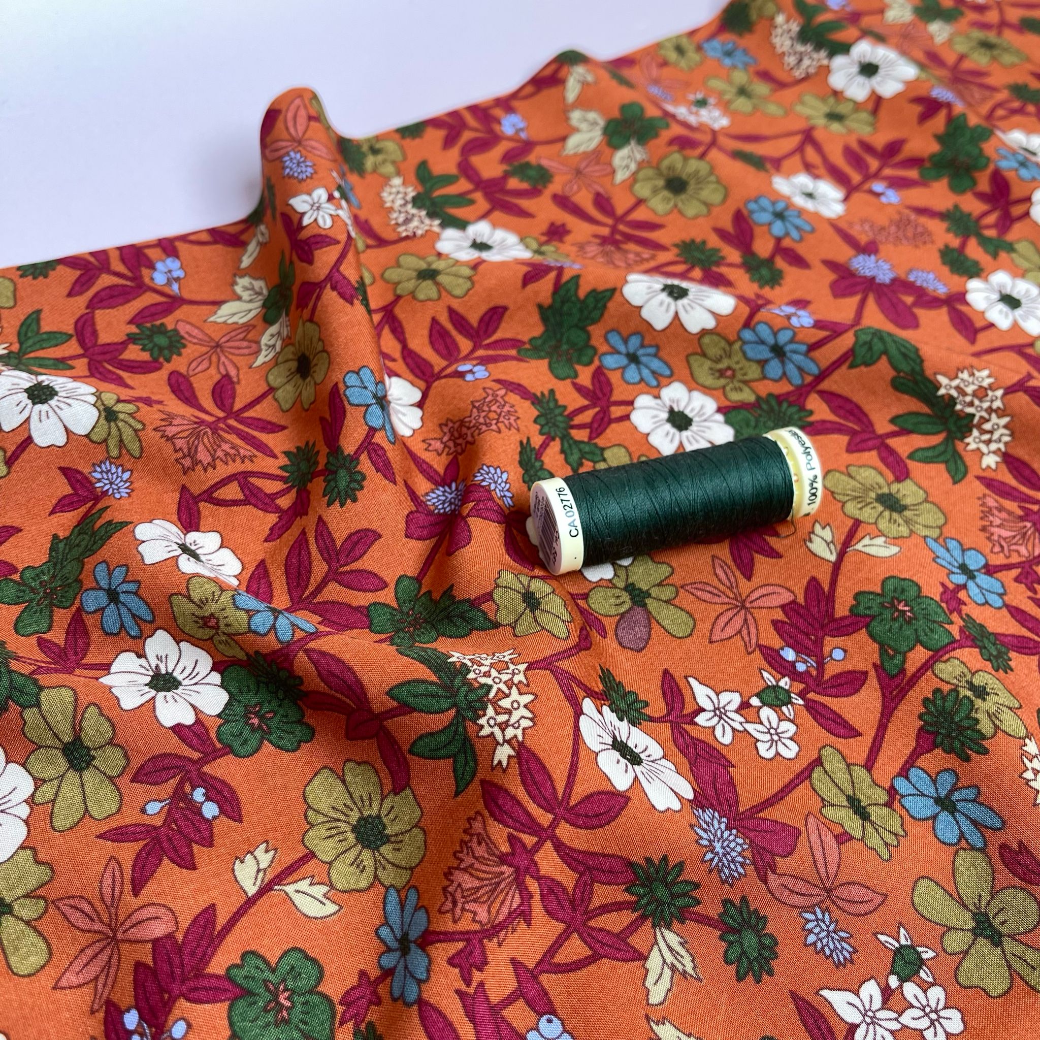 Autumn Blossoms on Orange Viscose Fabric