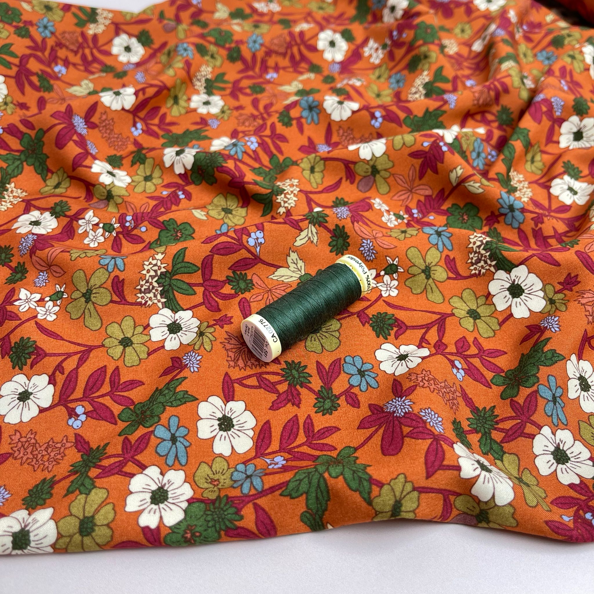 Autumn Blossoms on Orange Viscose Fabric