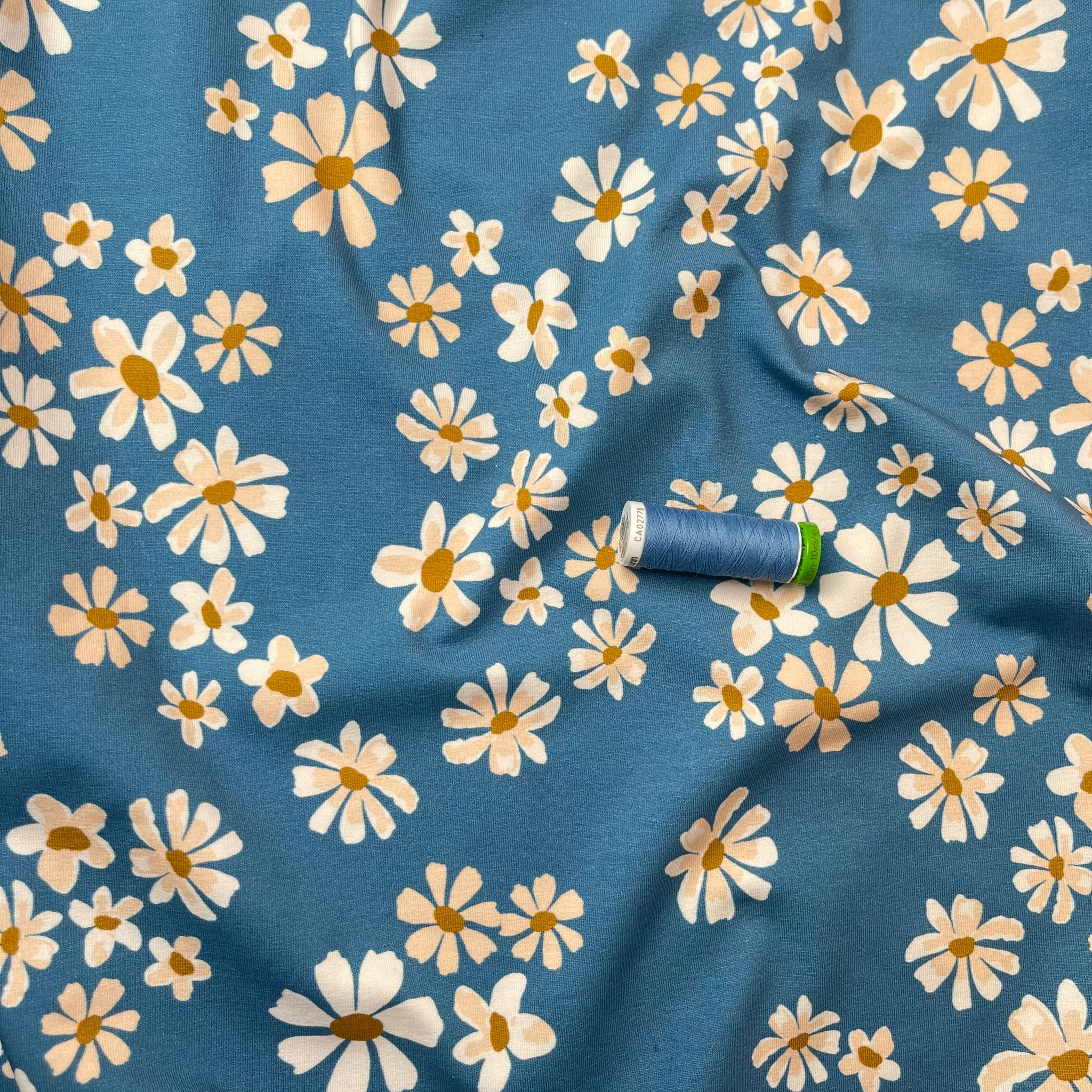 Danish Design - White Flowers on Blue Cotton Jersey Fabric
