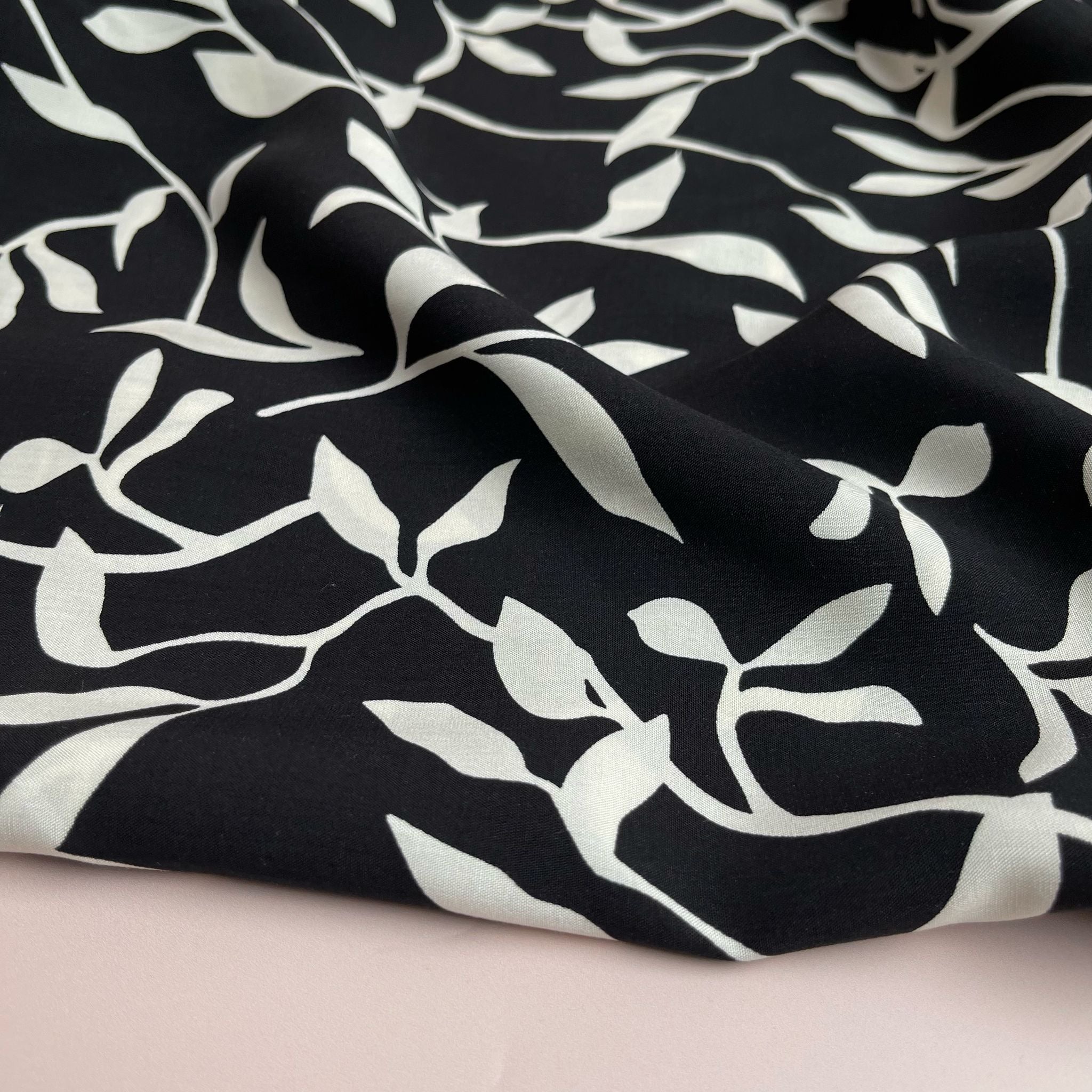 REMNANT 0.46 Metres - White Leaves on Black Viscose Fabric