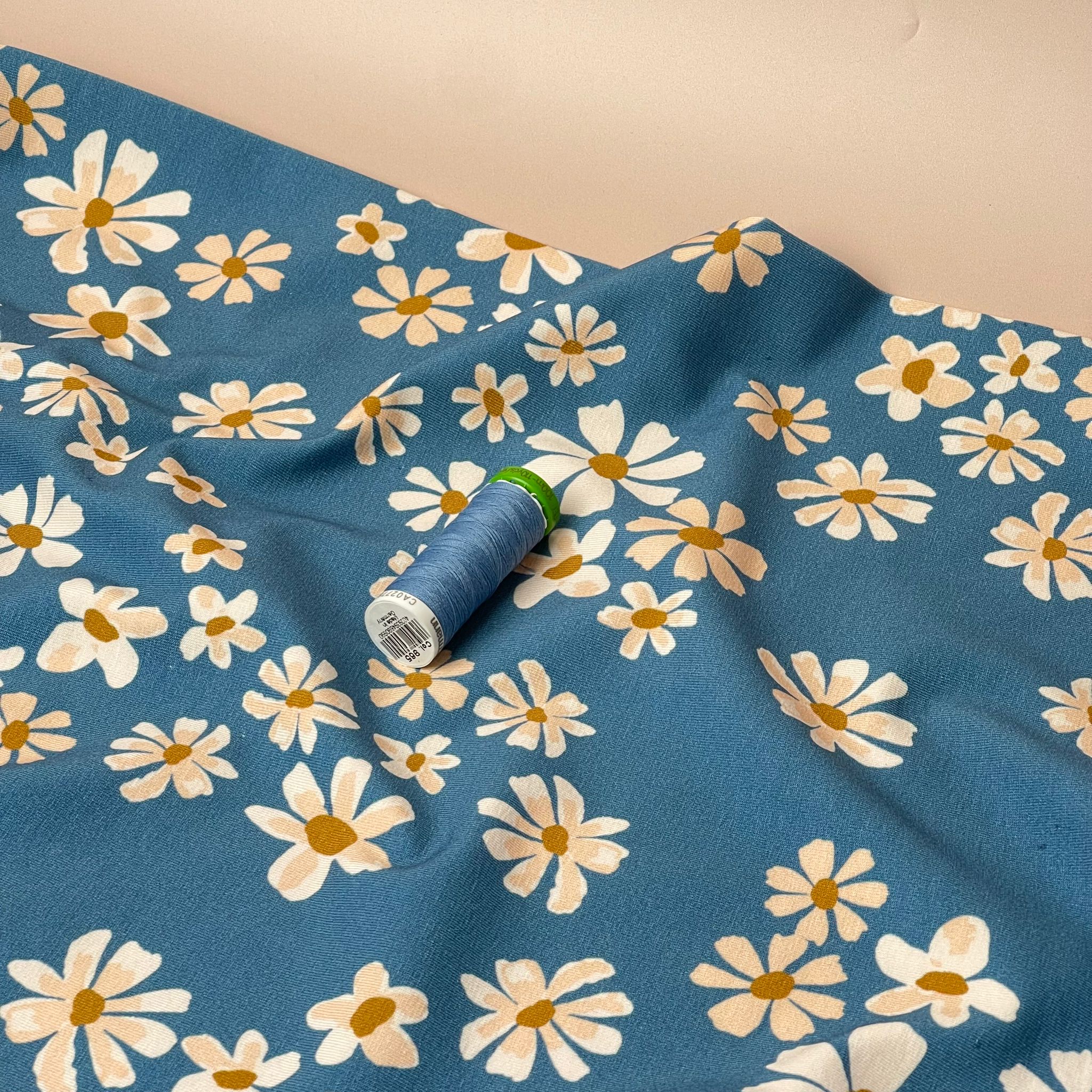 Danish Design - White Flowers on Blue Cotton Jersey Fabric