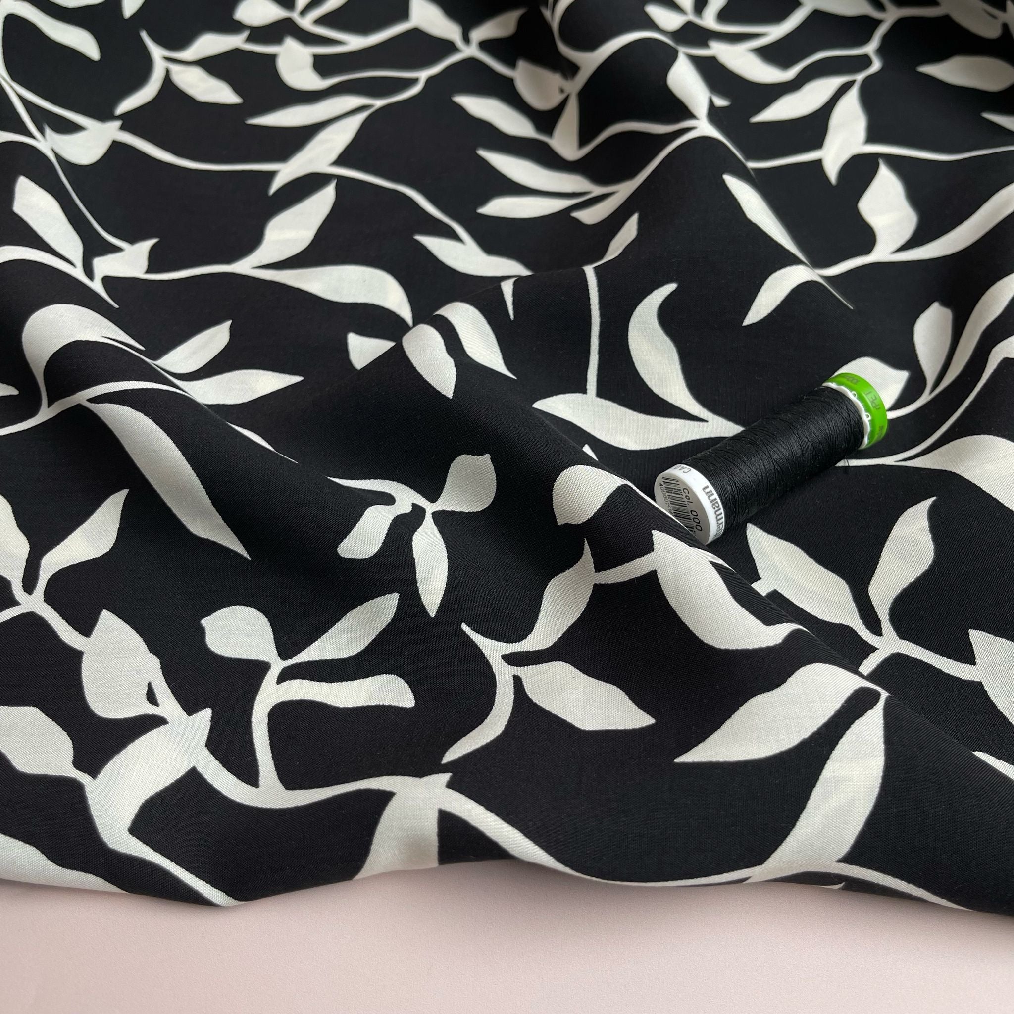 REMNANT 0.46 Metres - White Leaves on Black Viscose Fabric