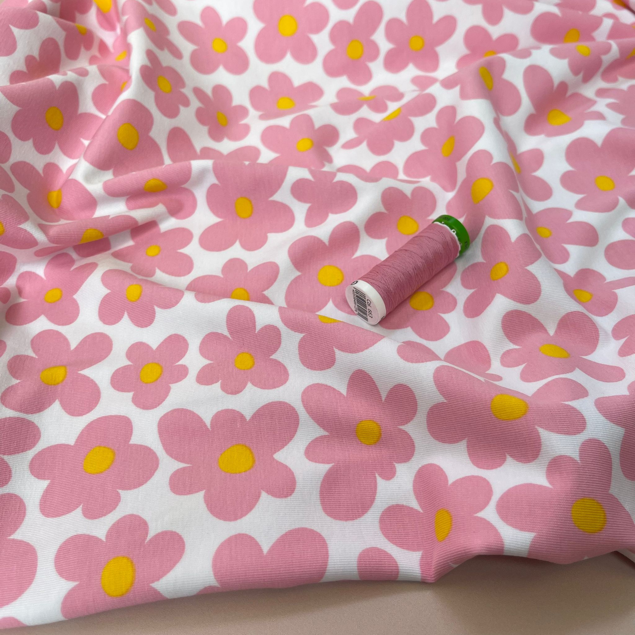 Pink Flowers on White Cotton Jersey Fabric