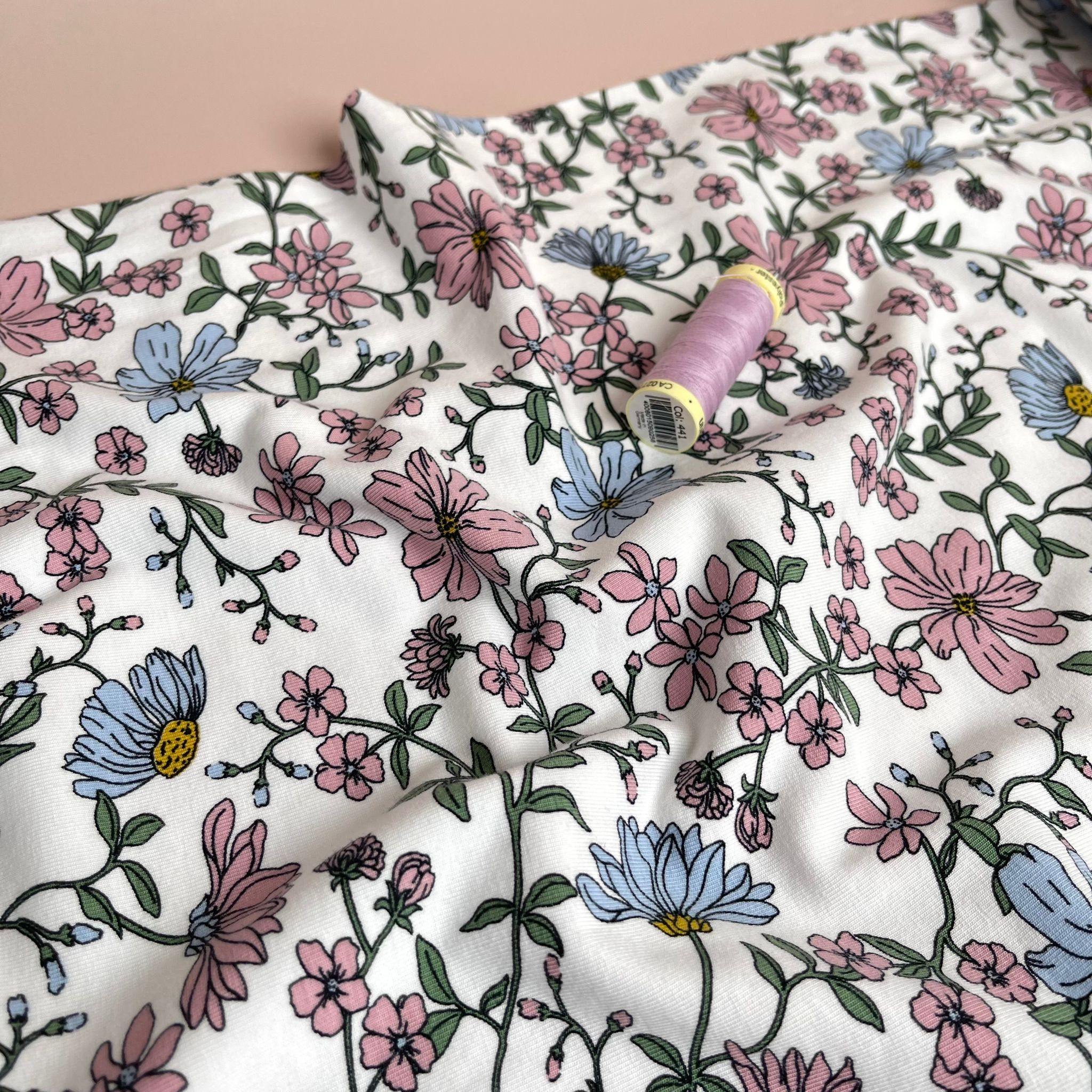 Pink Flowers on White Cotton Jersey Fabric