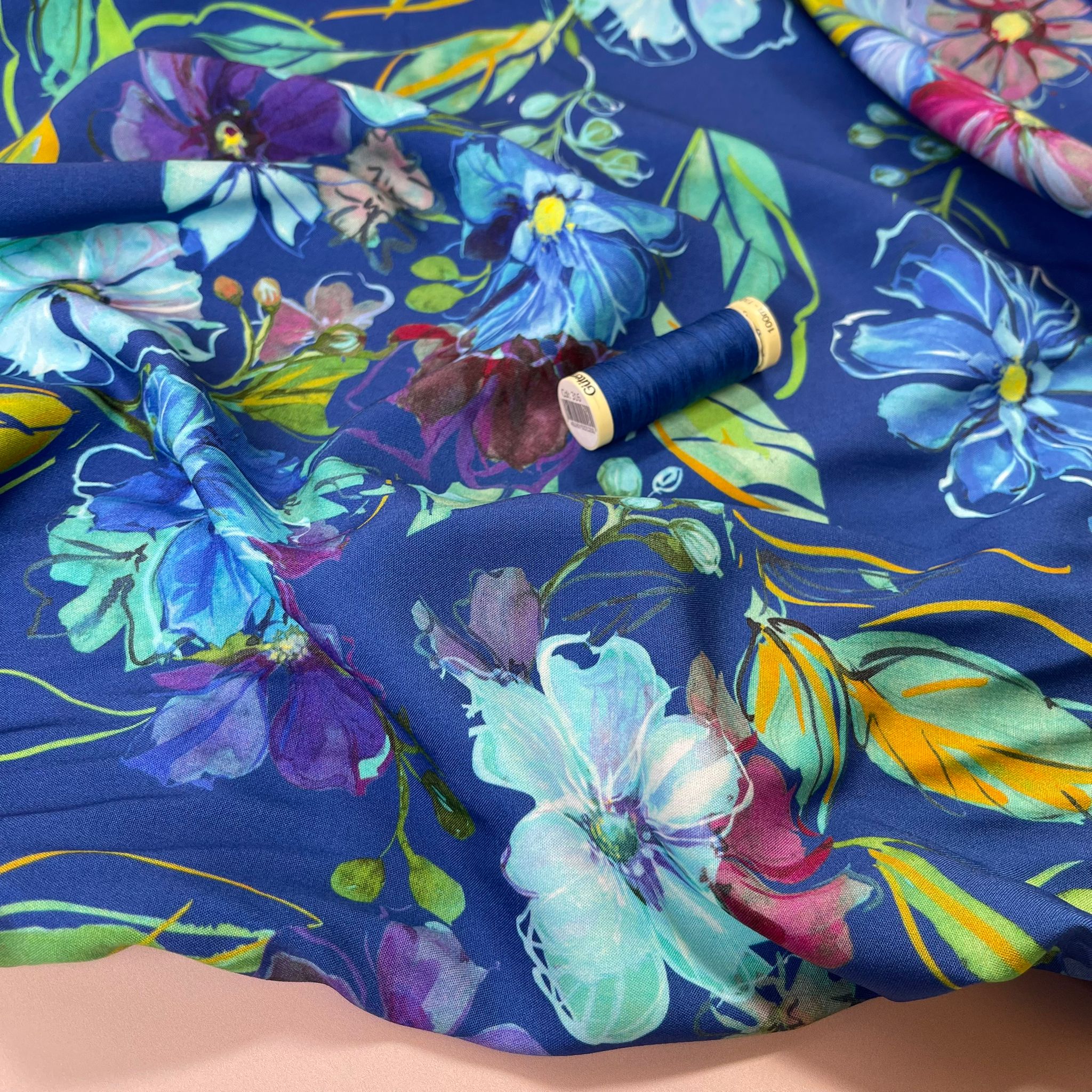 Painted Blooms on Blue Viscose Fabric