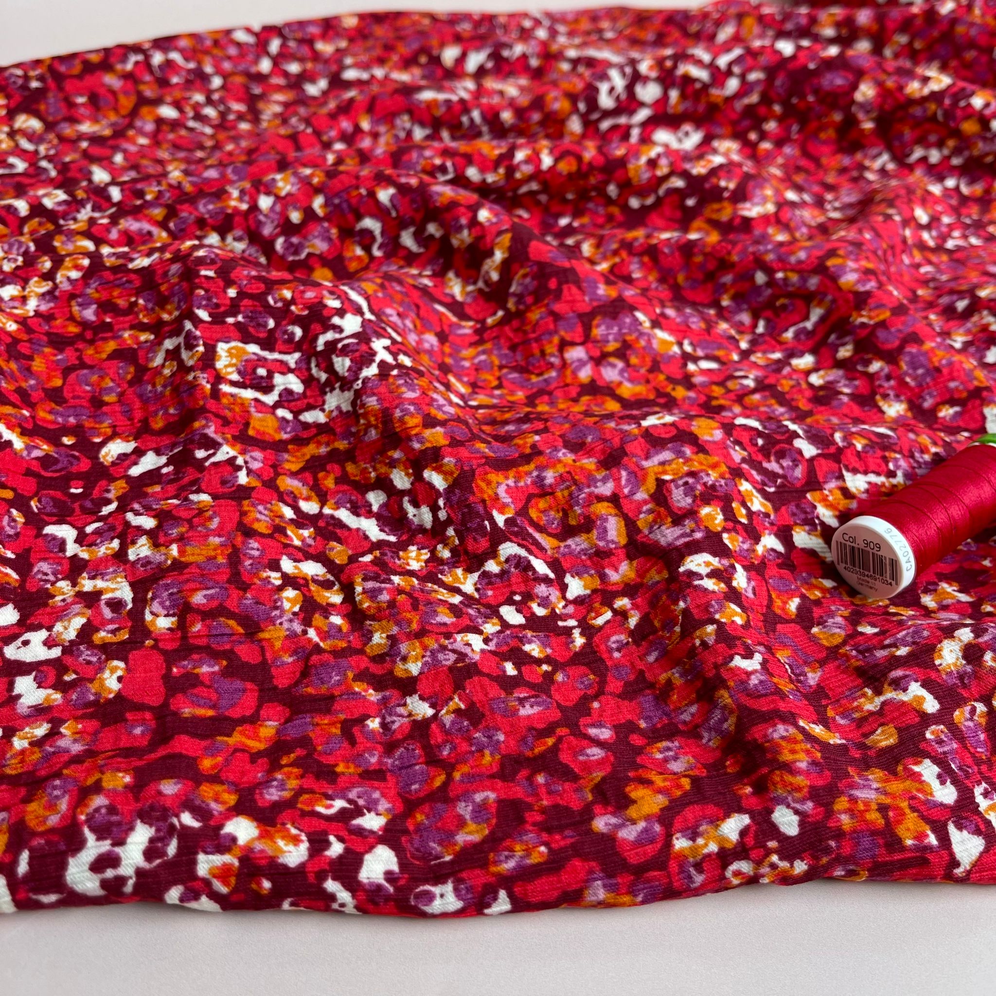 Sunset Dots Textured Viscose Crepe Fabric