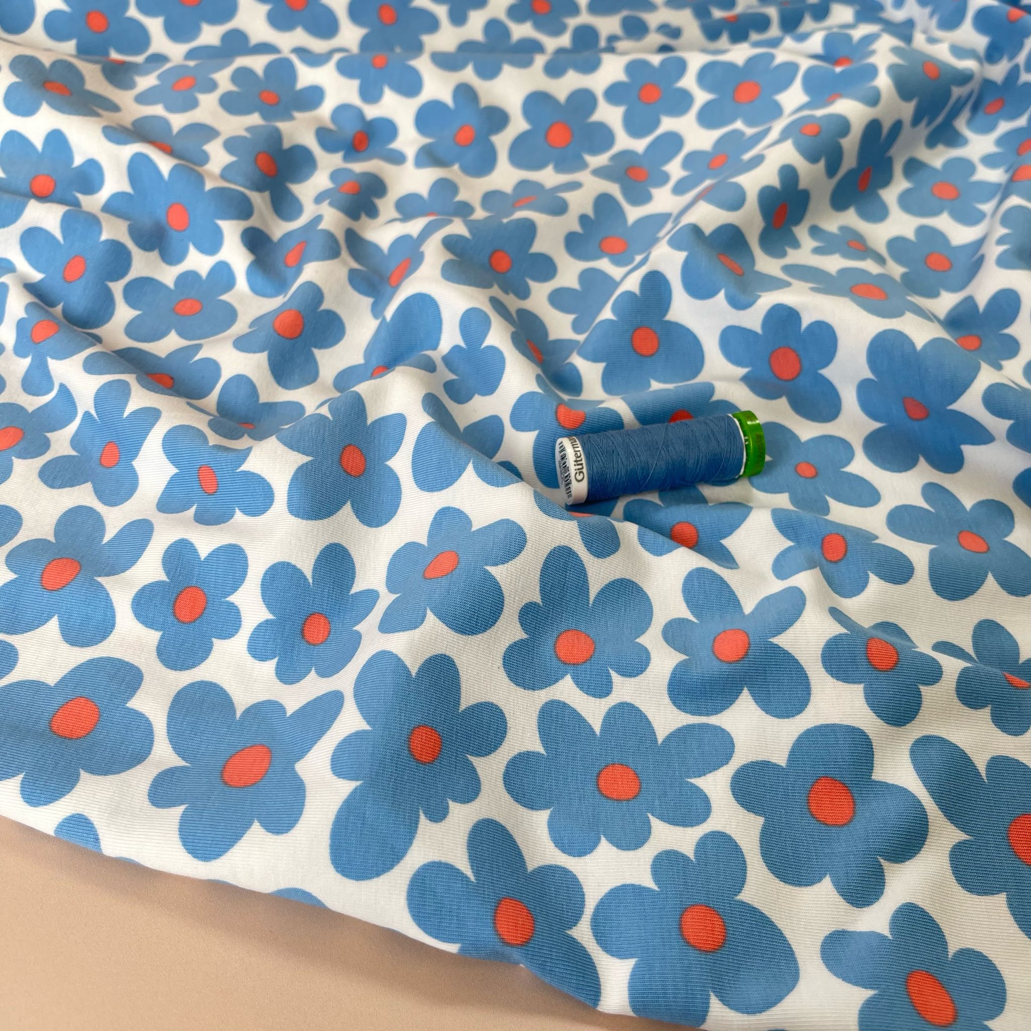 Fun Flowers in Blue Cotton Jersey Fabric