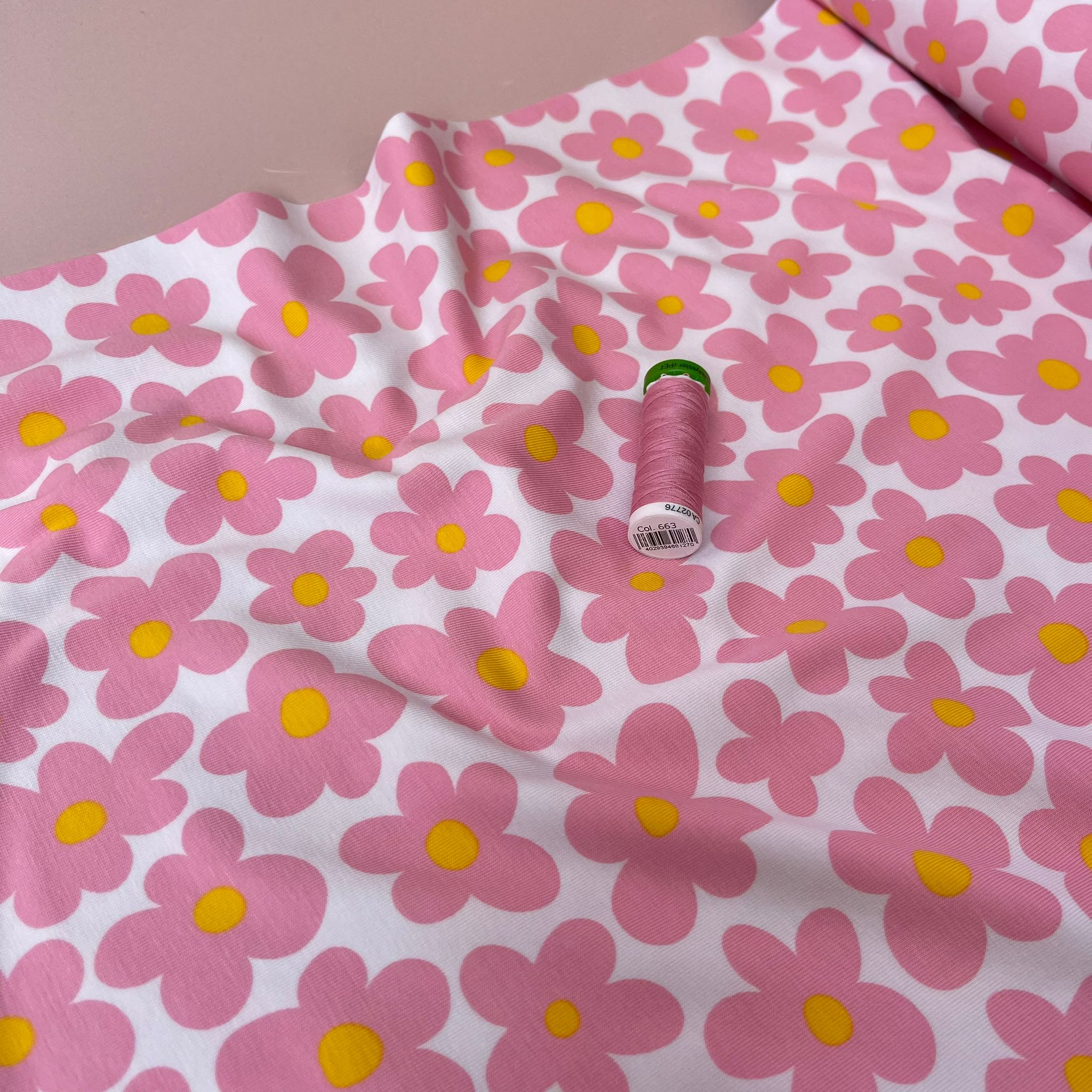 Pink Flowers on White Cotton Jersey Fabric
