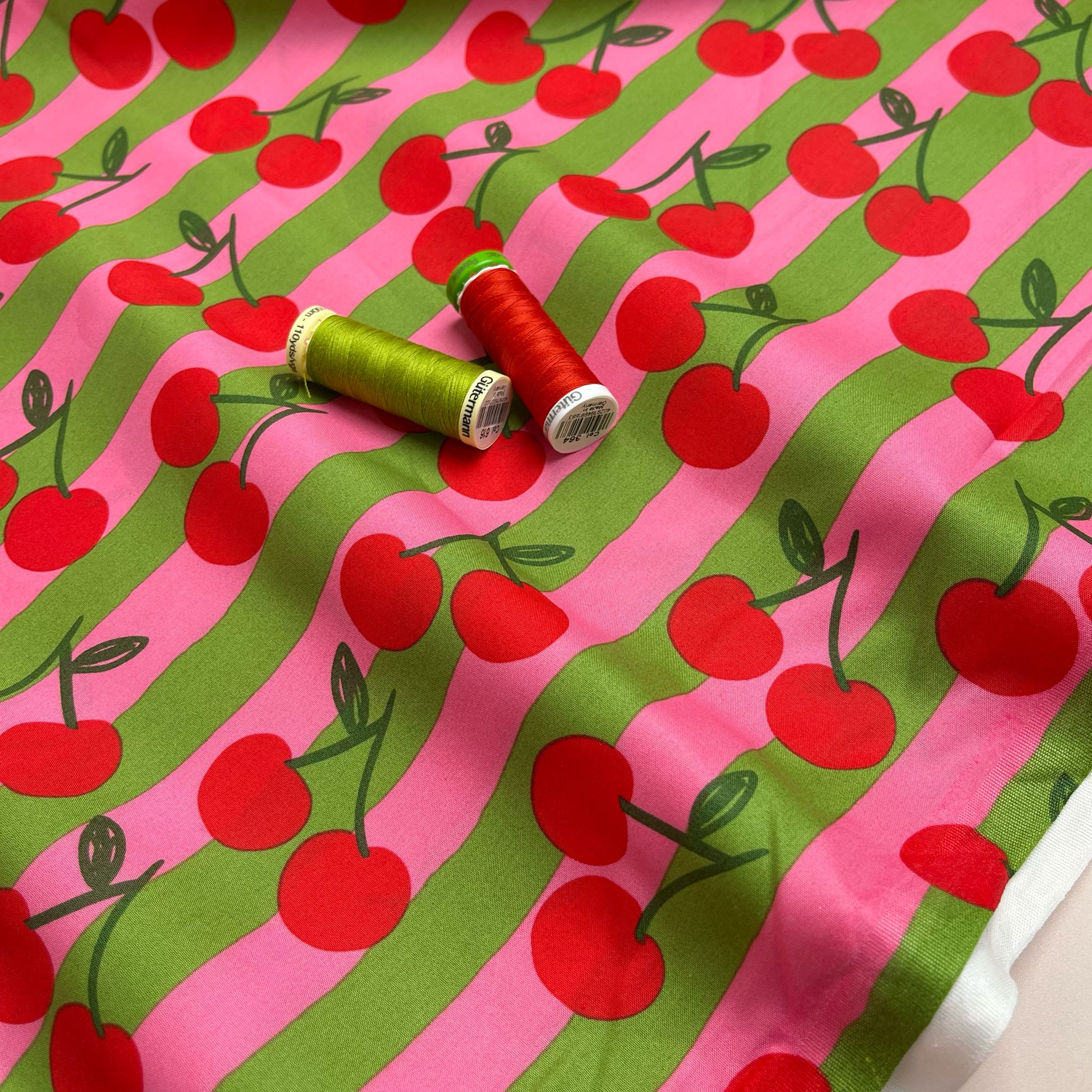 Funky Cherry Stripes on Pink Cotton Poplin Fabric