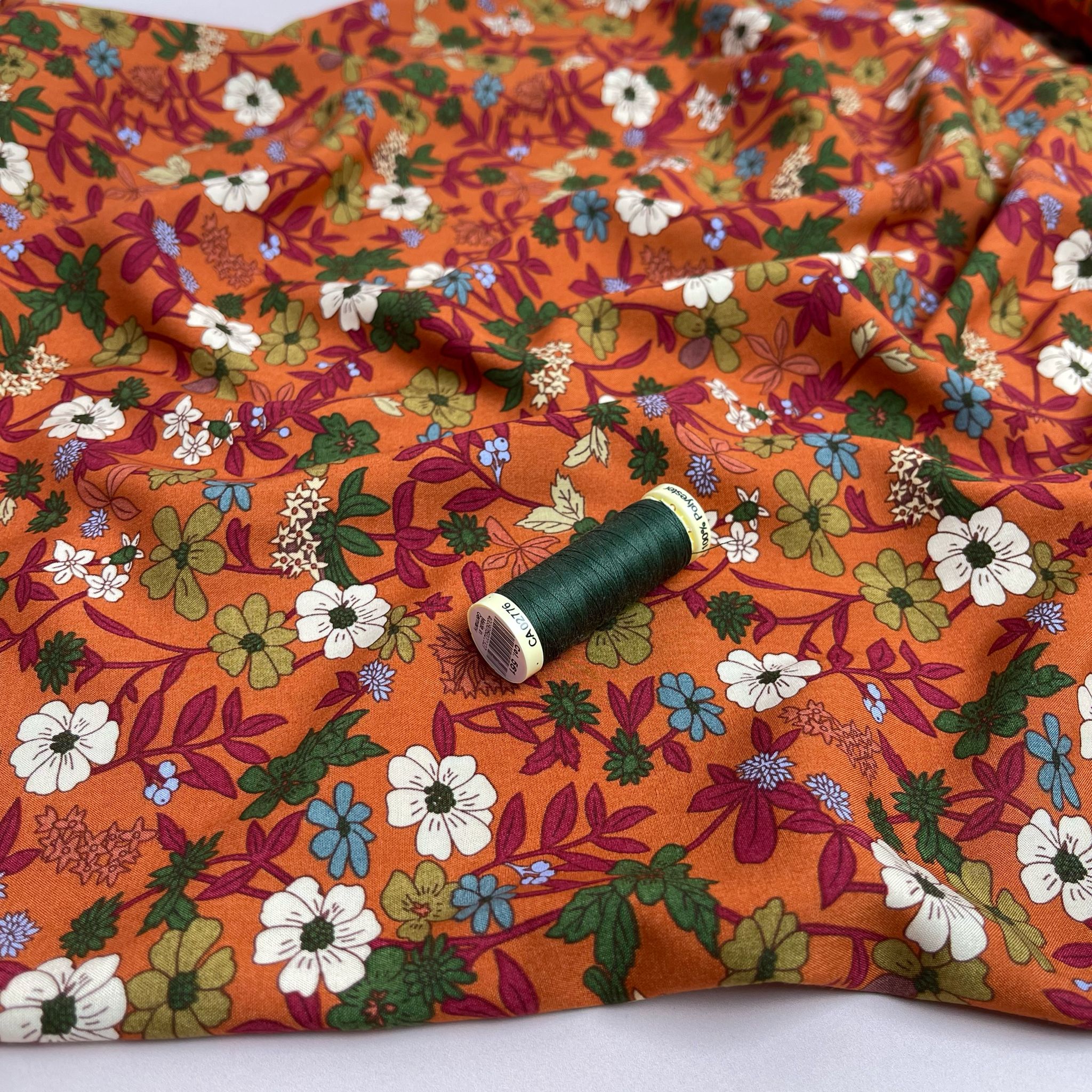 Autumn Blossoms on Orange Viscose Fabric