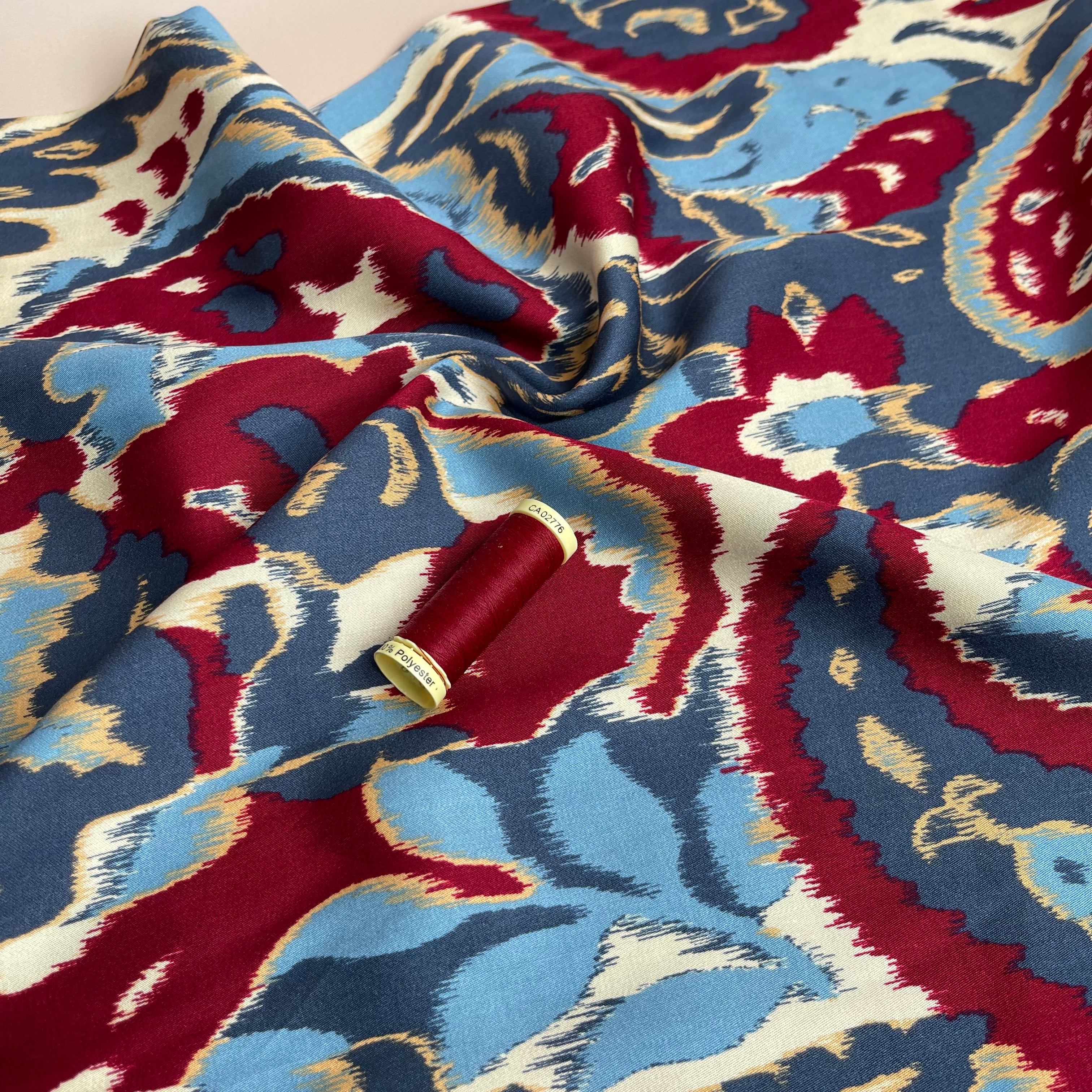 Hazy Paisley Blue and Red Viscose Sateen Fabric