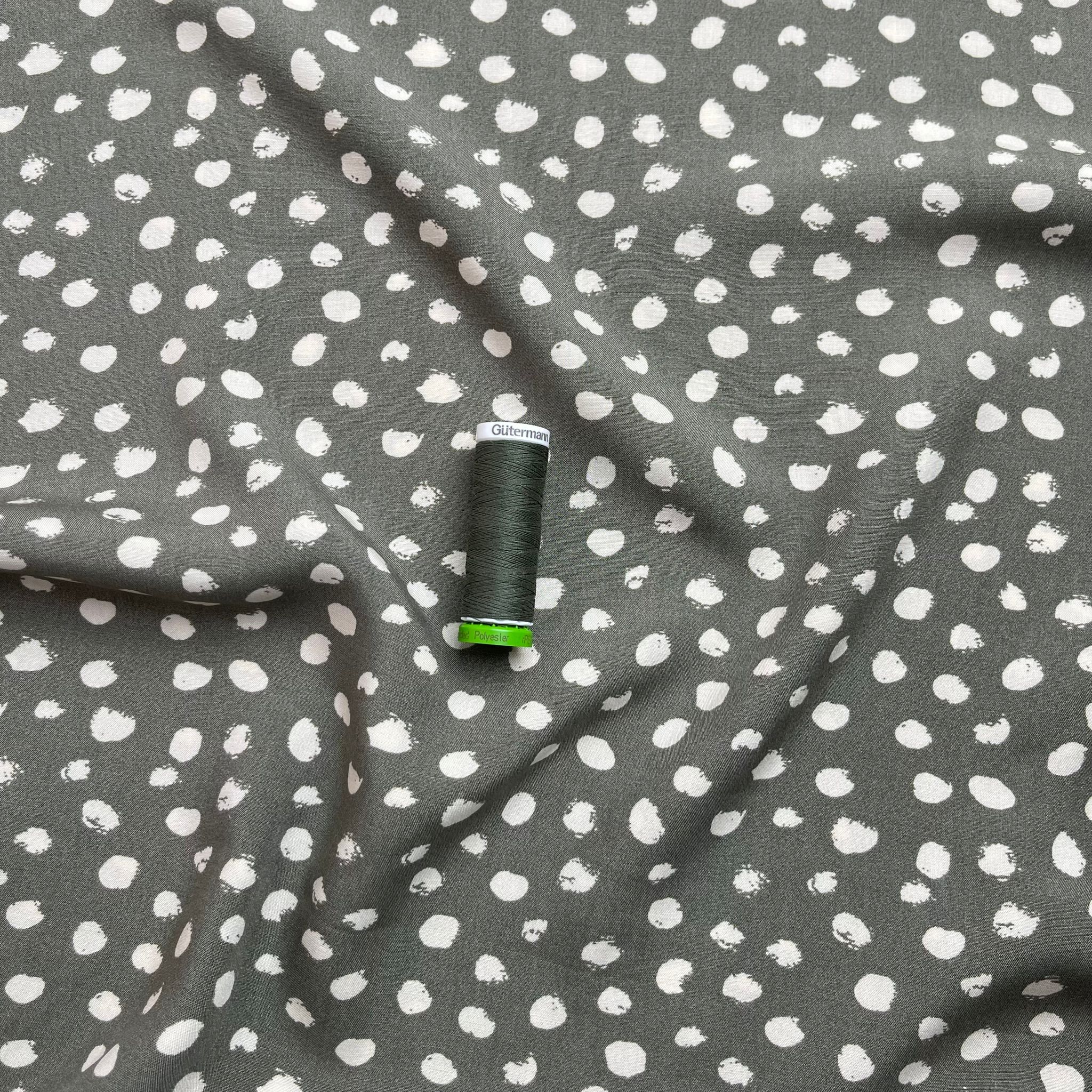 Abstract Dots on Green Viscose Fabric