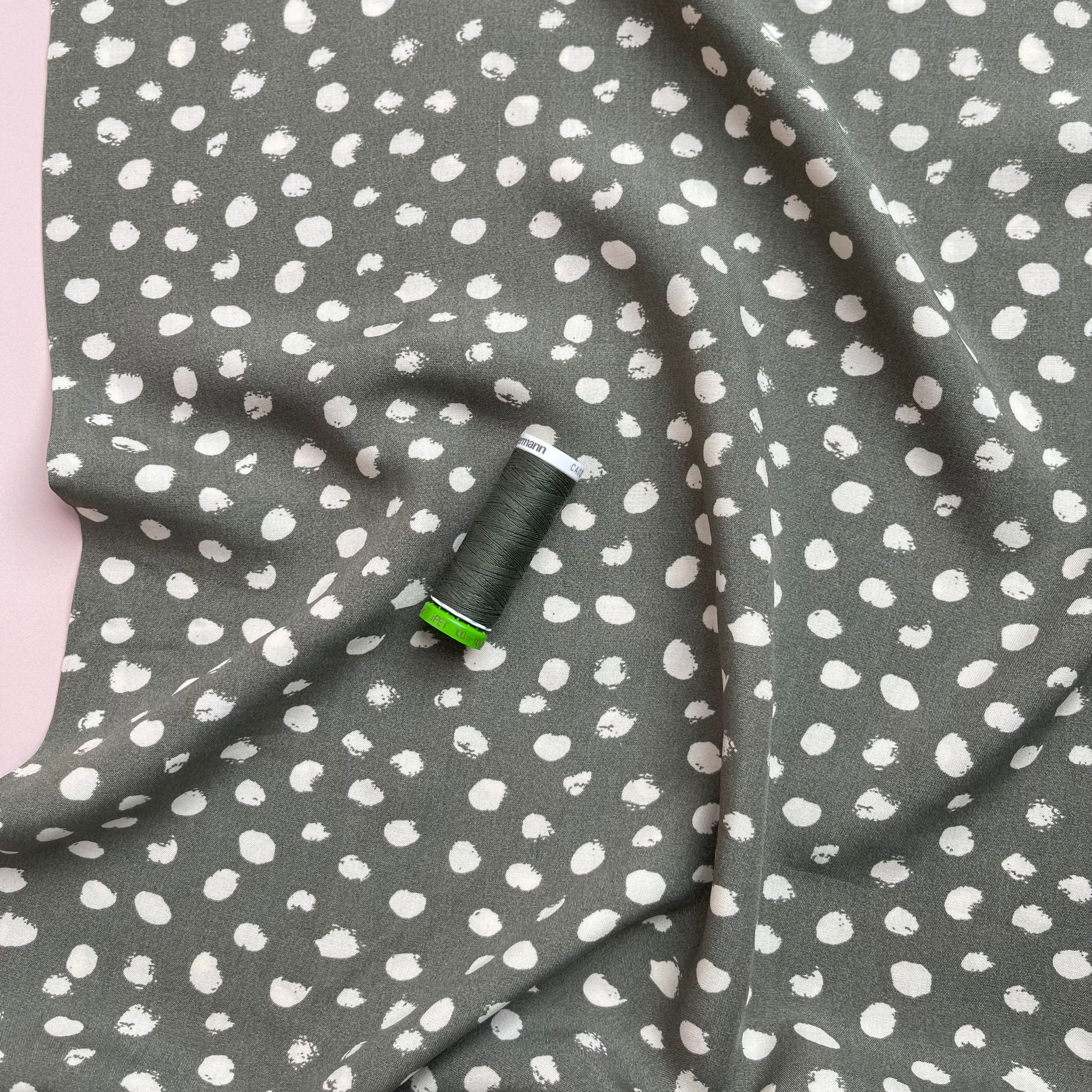 Abstract Dots on Green Viscose Fabric