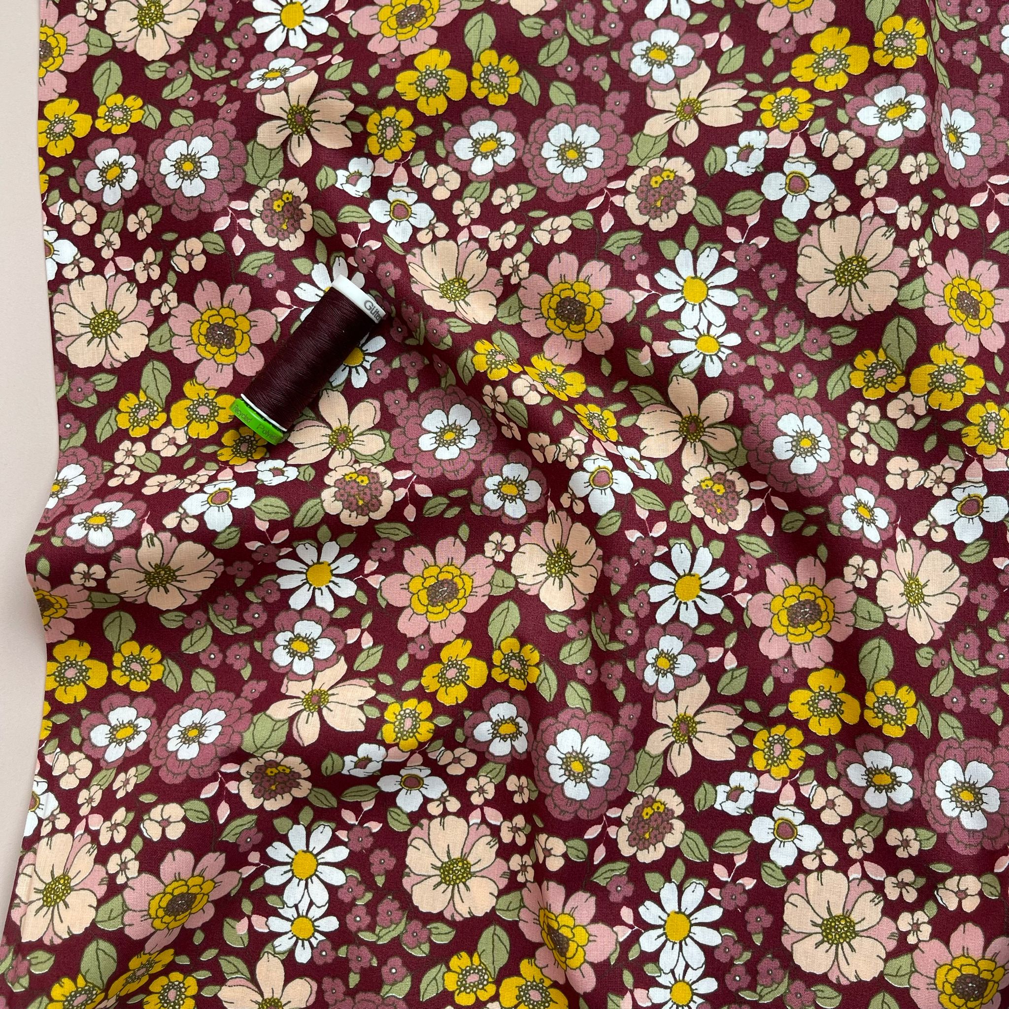 Blooms on Burgundy Cotton Poplin Fabric