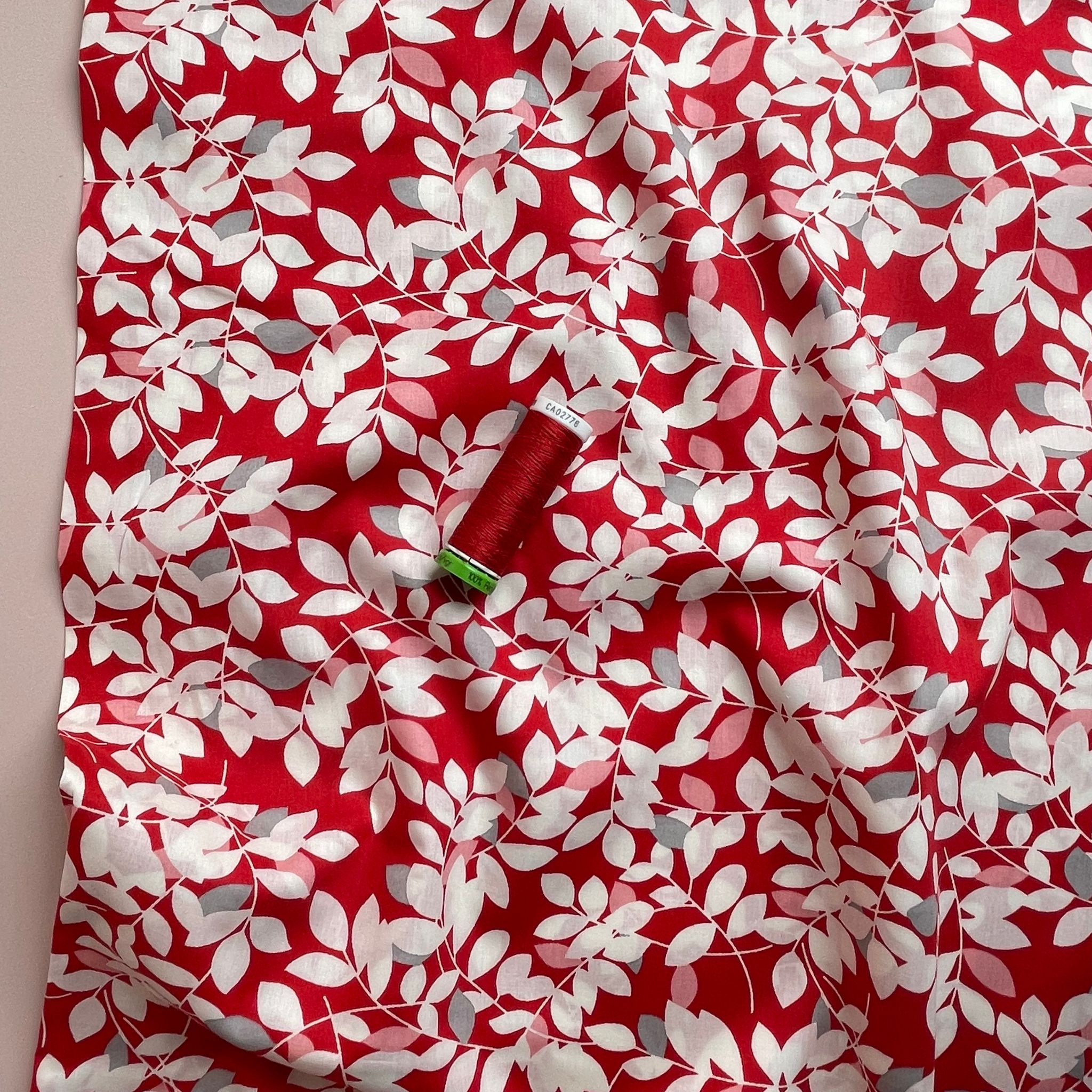 White Foliage on Red Cotton Lawn Fabric