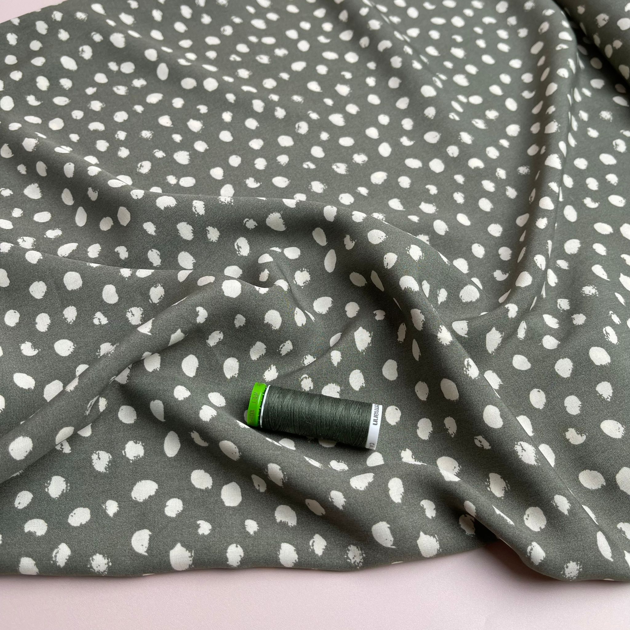 Abstract Dots on Green Viscose Fabric