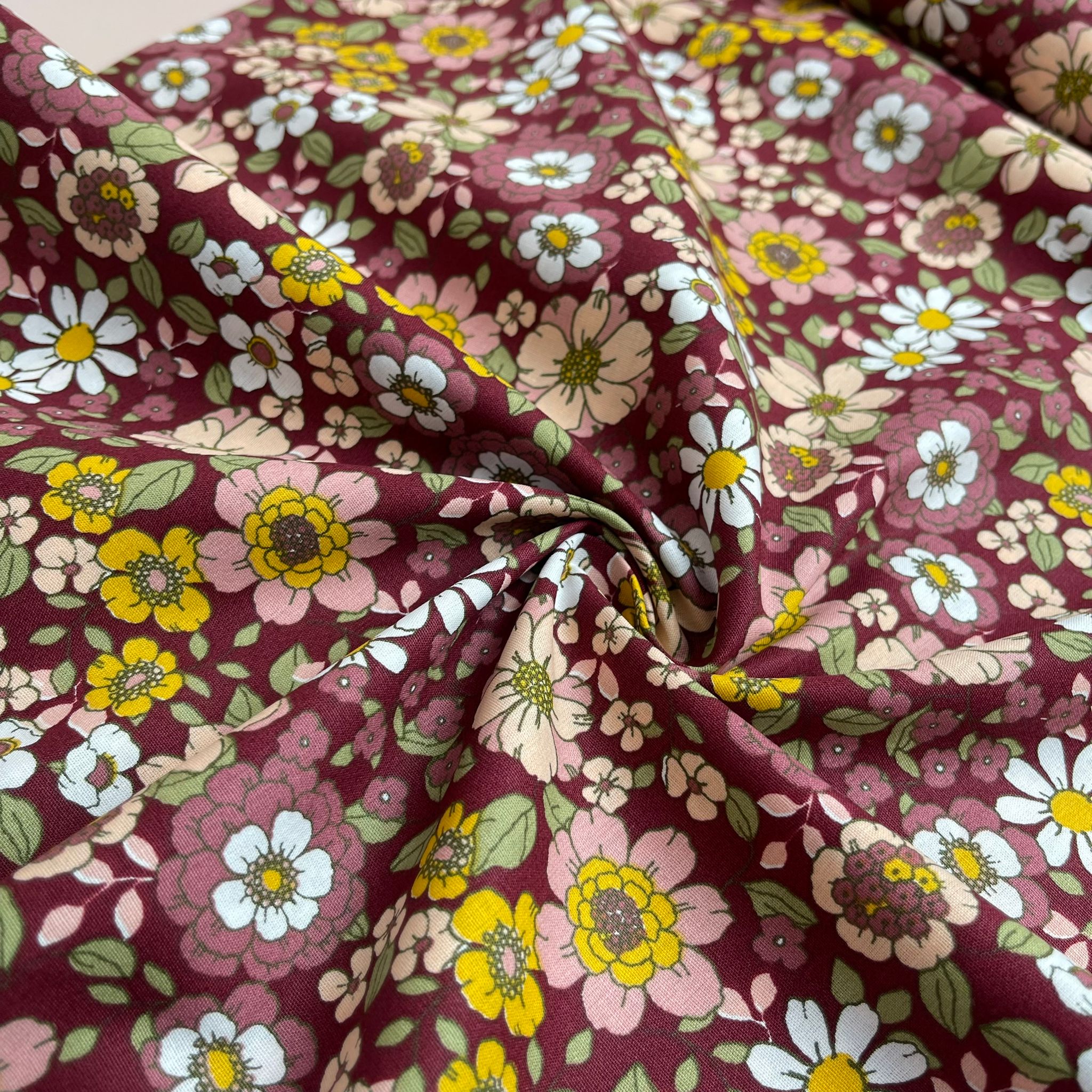 Blooms on Burgundy Cotton Poplin Fabric