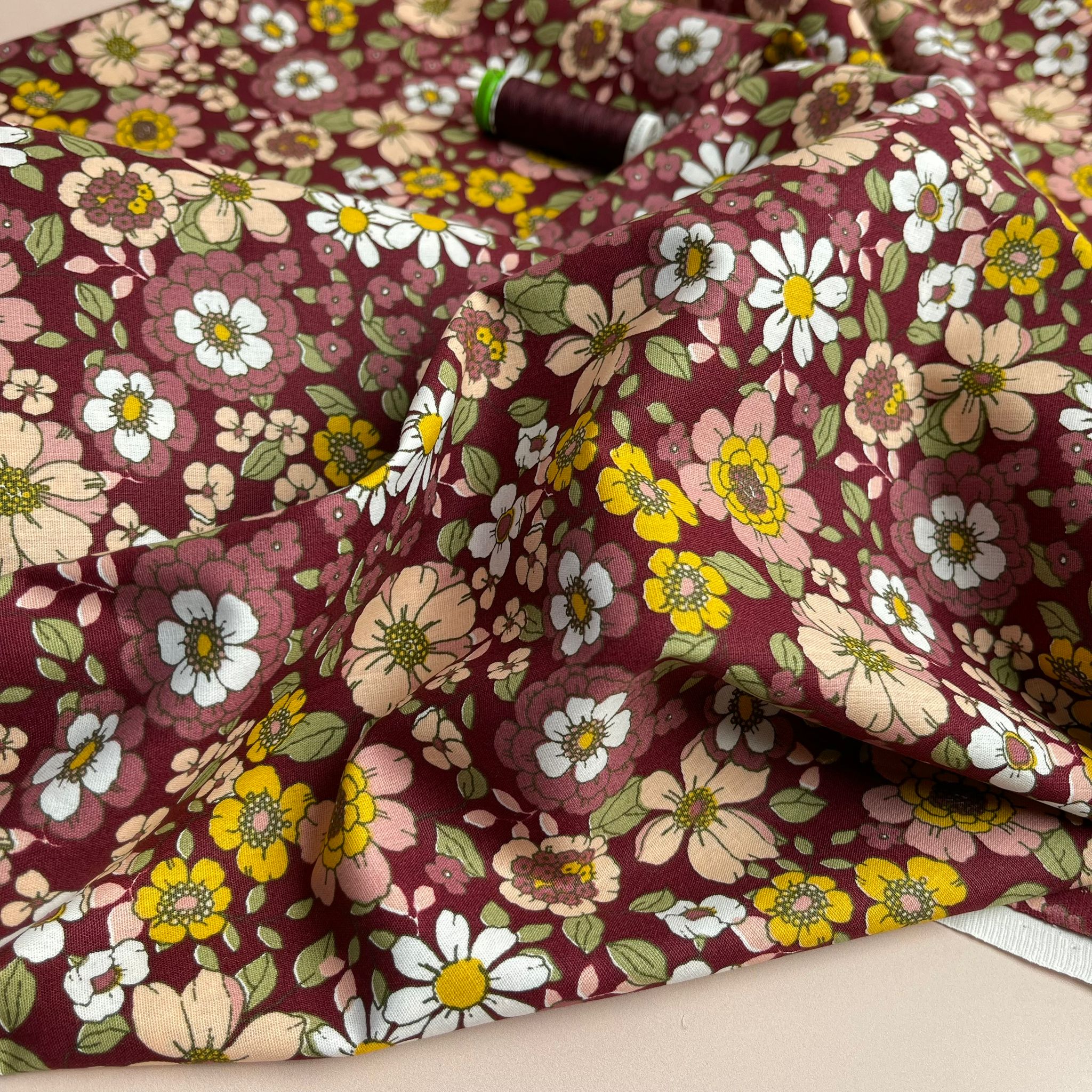 Blooms on Burgundy Cotton Poplin Fabric