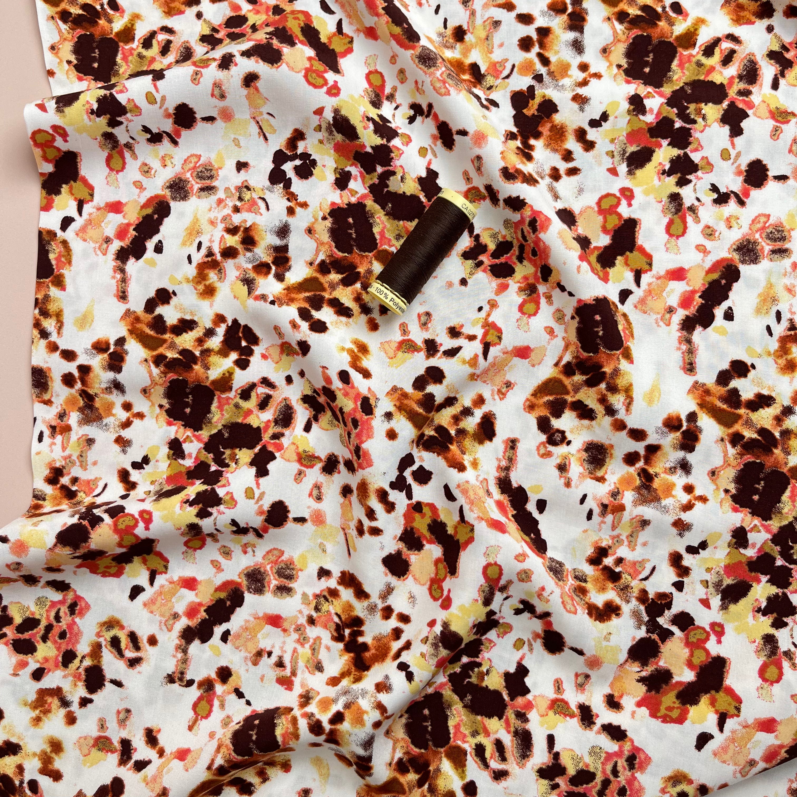 Watercolour Splash in Rust Viscose Poplin Fabric